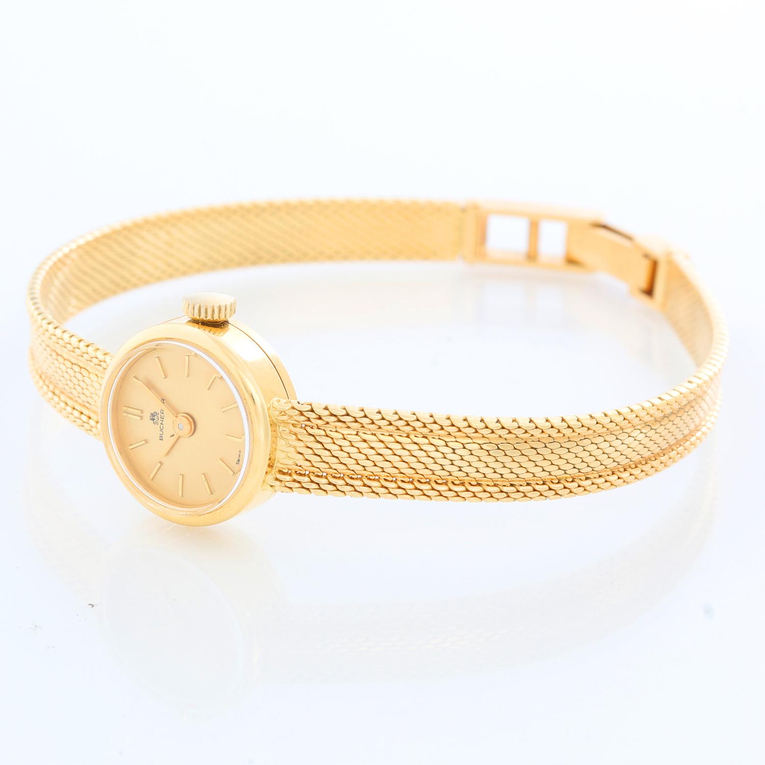 Bucherer 18K Yellow Ladies Gold Watch - Manual. 18k Yellow Gold ( 15 mm ). Champagne dial with stick hour markers. Mesh 18K yellow gold bracelet. Will fit up to a 6.25 inch wrist. Pre-owned with custom box. 