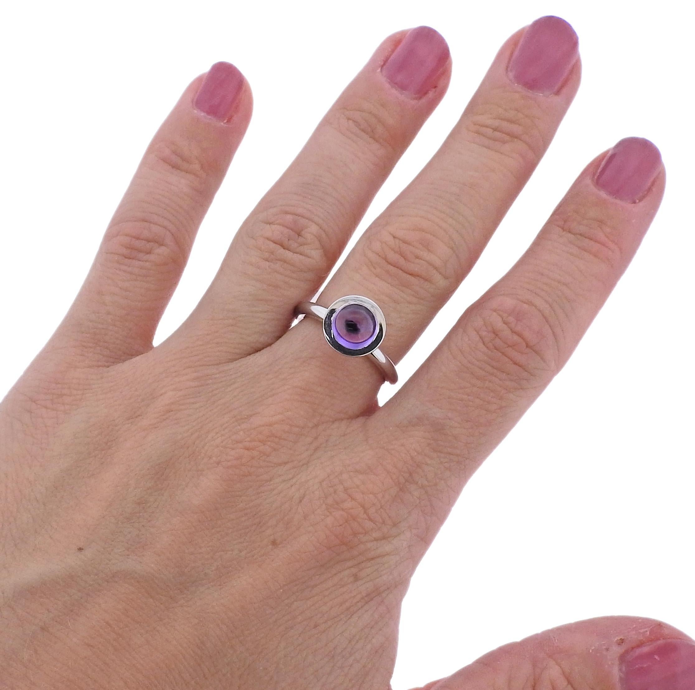 Brand new with tag Bucherer 18k gold ring, with 2.30ct amethyst. Retail $2630. Comes with box.  Ring size 7, Ring top is 10mm in diameter.  Weight - 8.1 grams. Marked: CB 750.