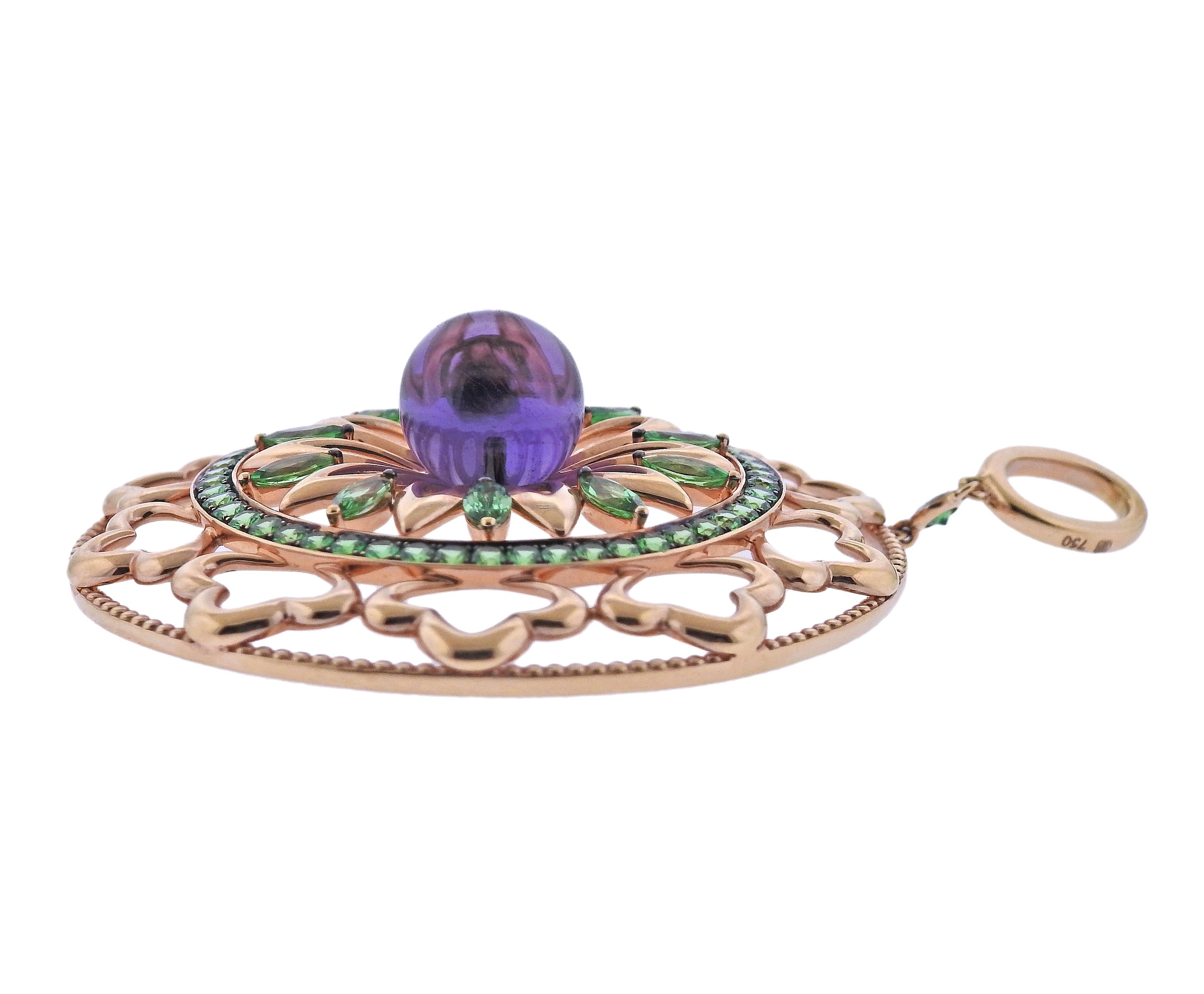 Brand new with tag Bucherer pendant, in 18k gold, with 12ct amethyst and 4.60ctw tsavorite.  Retail $8490. Comes with box.  Pendant is 50mm in diameter ( 2