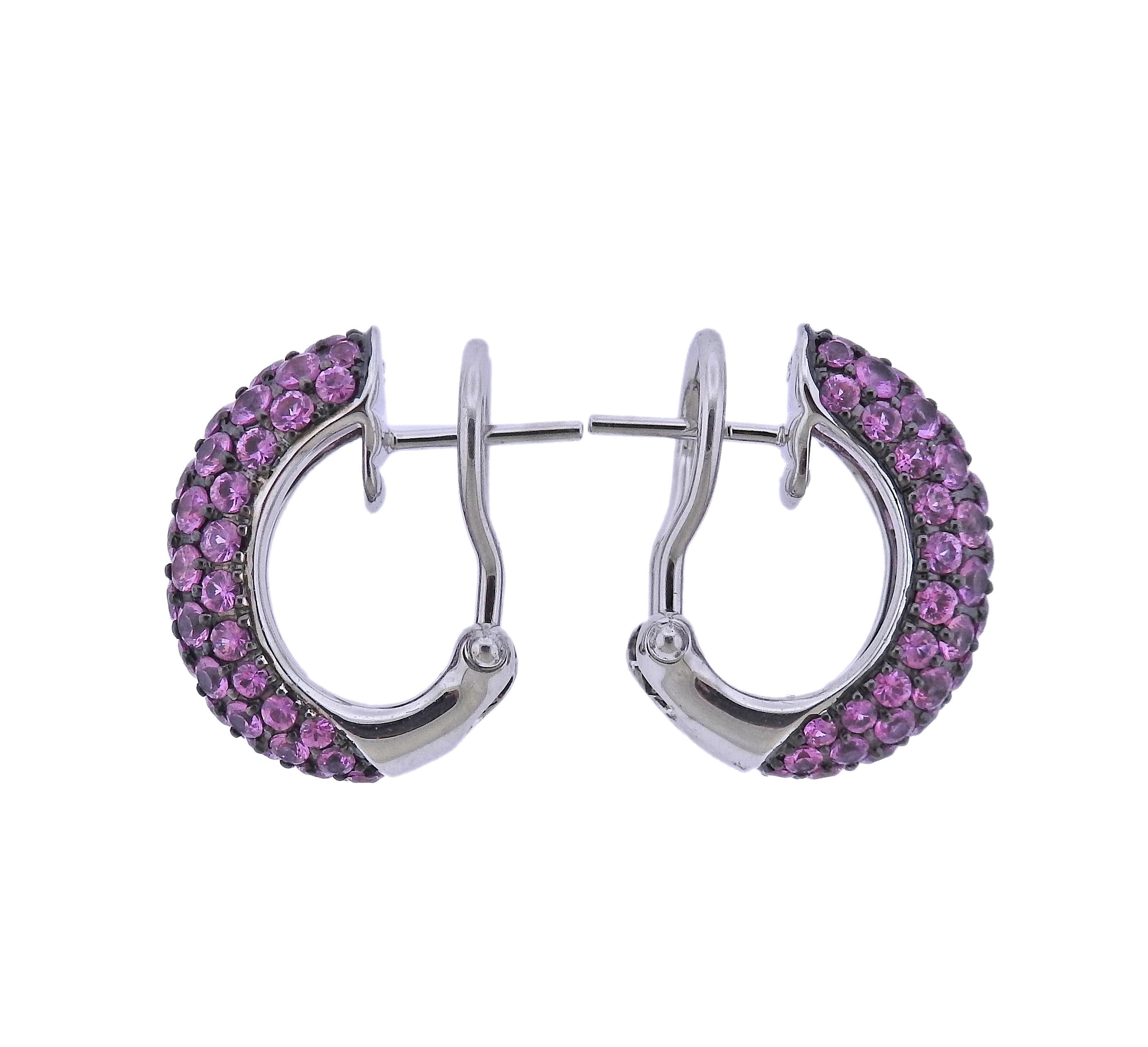 Brand new with tag Bucherer earrings, with 3.73ctw in pink sapphires. Retail $2510. Comes with box.  Earrings are 18mm x 6.5mm. Weight - 8.1 grams. Marked: CB 750.