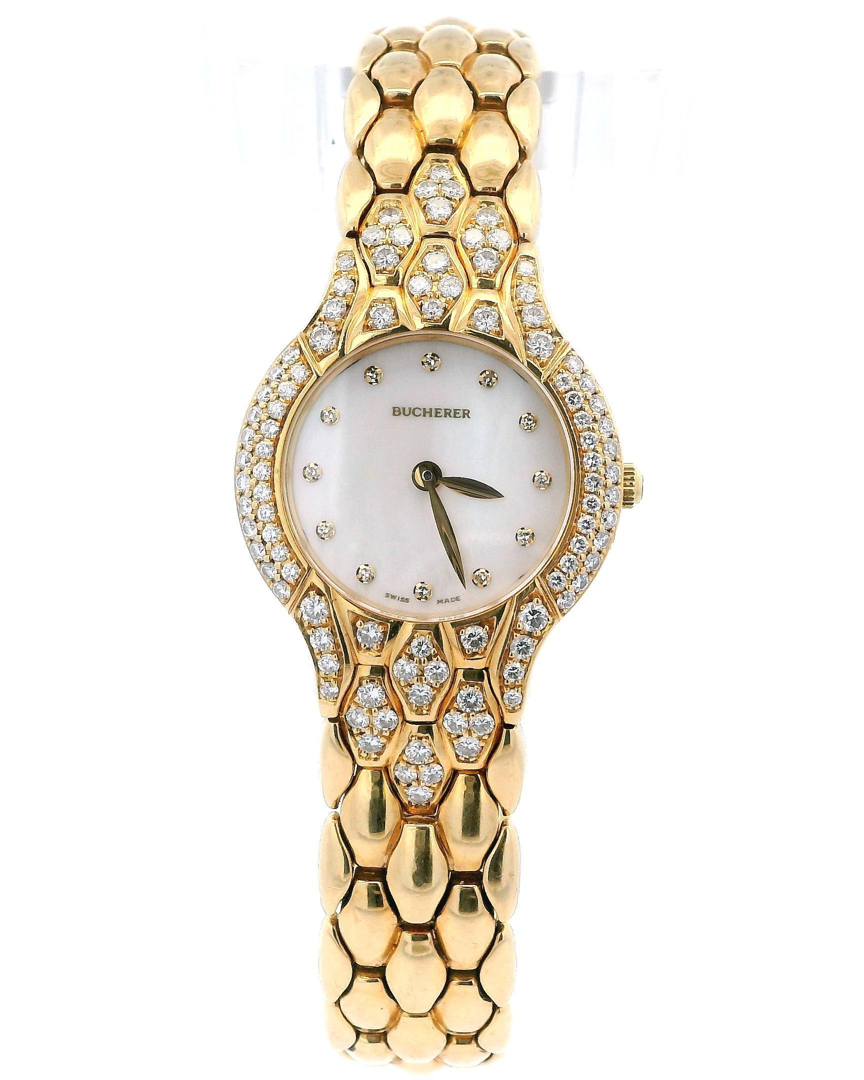 Bucherer Medea MOP Dial yellow Gold Ladies Watch. 24.4mm 18k Yellow Gold case & factory set diamonds bezel and lugs. Mother-of-Pearl dial with gold hands and factory set diamond hour markers. 18K Yellow Gold Bracelet with hidden Butterfly Clasp.