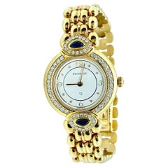 Bucherer Montre pour femme Paradiso en or jaune 18 carats, diamants et saphirs