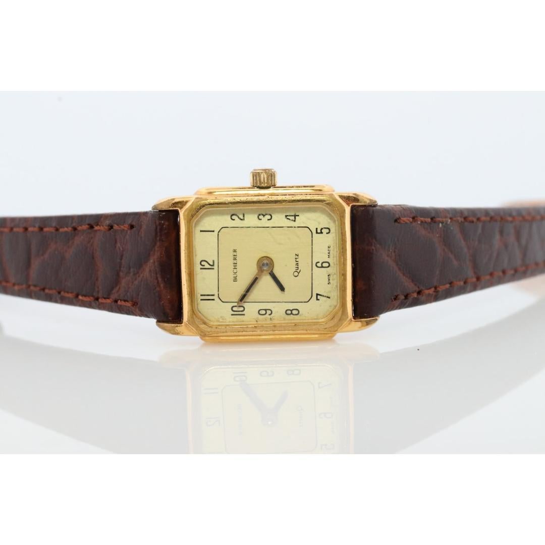 Bucherer Quartz wristwatch. Gold-tone bezel SWISS battery watch. Minimalist 3