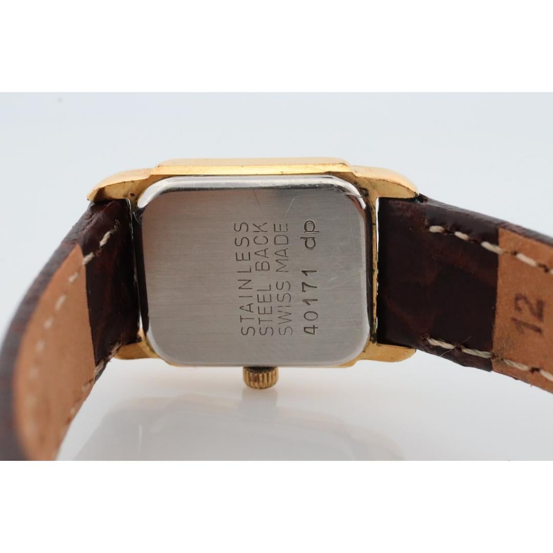 Bucherer Quartz wristwatch. Gold-tone bezel SWISS battery watch. Minimalist 1
