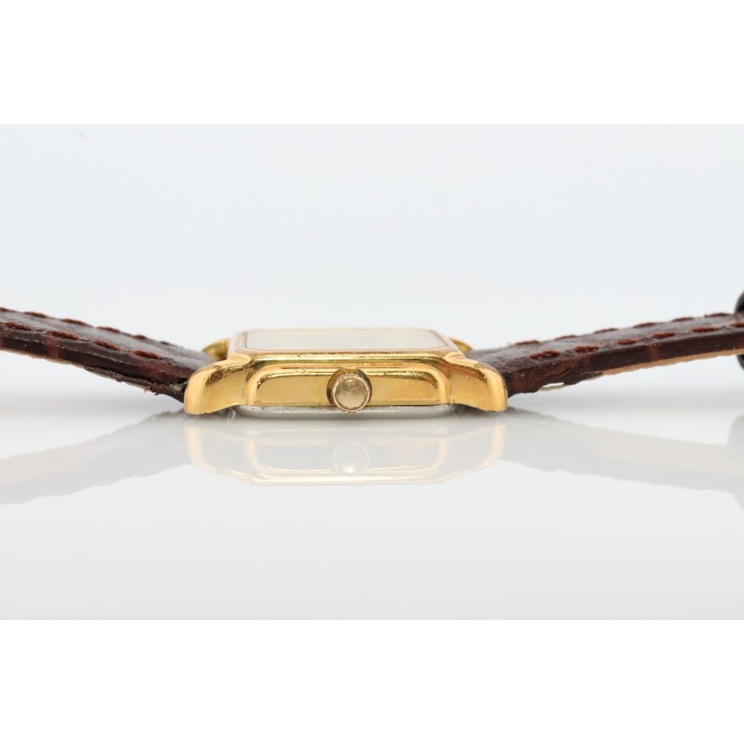Bucherer Quartz wristwatch. Gold-tone bezel SWISS battery watch. Minimalist 2