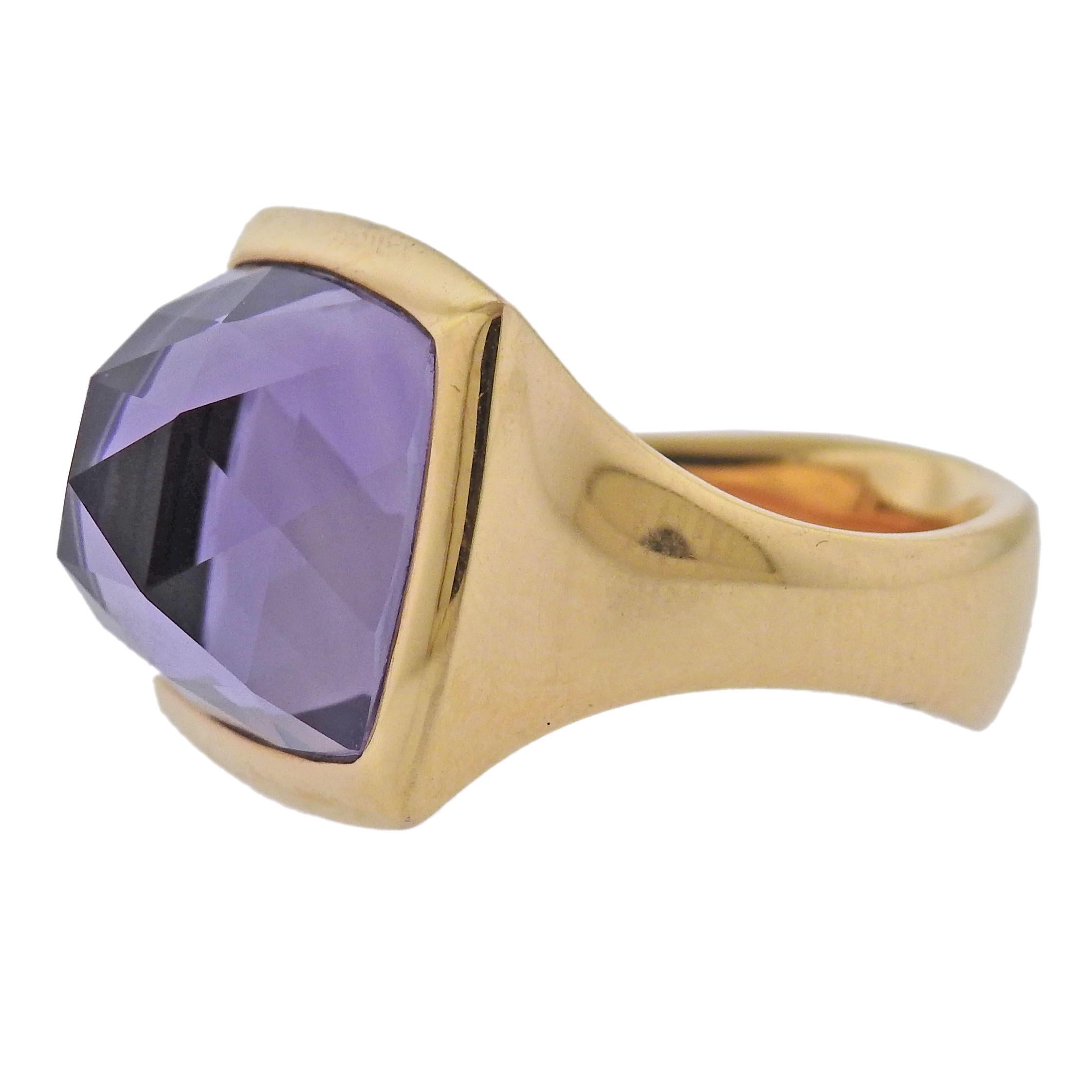 Brand new with tag Bucherer ring, in 18k gold with 12ct faceted amethyst. Retail $7000. Comes with box.  Ring size - 6.25, ring top is 18 x 18mm. Weight - 22.5 grams. Marked: CB 750.
