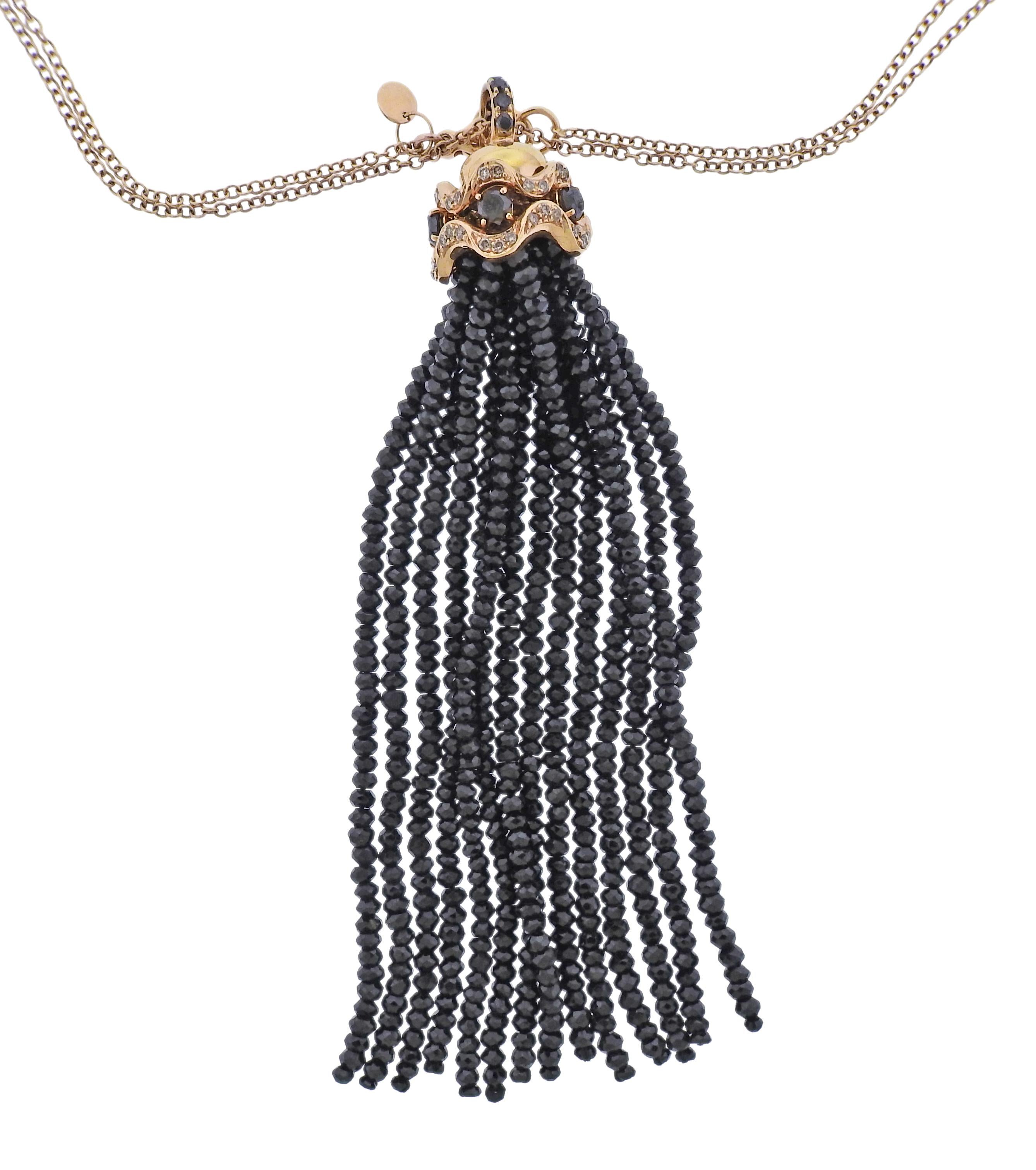 Brand new with tag Bucherer 18k gold long necklace with tassel pendant, set with 0.65ctw SI/Fancy diamonds, 145ctw spinel and 5ctw onyx. Retail $6830. Comes with box.  Necklace is 36