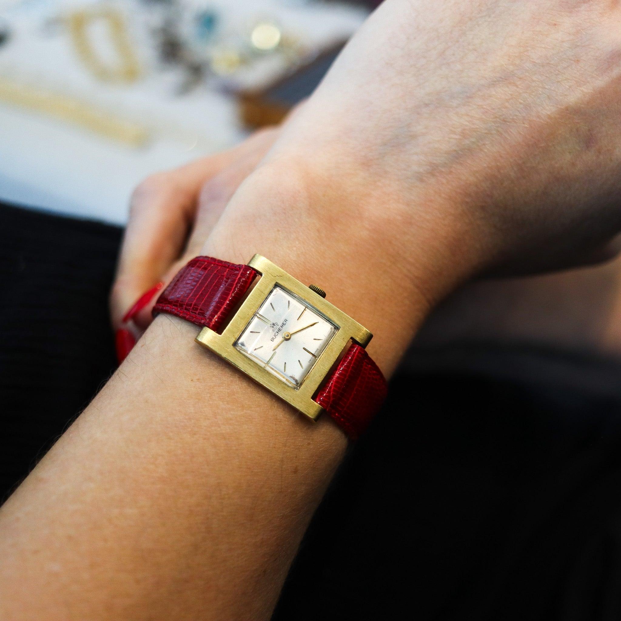 A wrist watch designed by Bucherer.

This is a classic manual wingding wrist watch, created in Switzerland by the company of  Bucherer. The case has been designed in the shape of a H and was crafted in solid yellow gold of 18 karats with a delicate