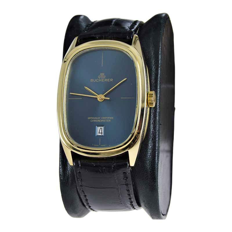FACTORY / HOUSE: Bucherer Watch Company
STYLE / REFERENCE: Oversized Oval 
METAL / MATERIAL: 18 Kt. Solid Gold
DIMENSIONS: 42mm X 29mm
CIRCA: 1980's
MOVEMENT / CALIBER: Automatic Winding / 25 Jewels / 5 Adjustments / Cal. ETA 2829 
DIAL / HANDS: