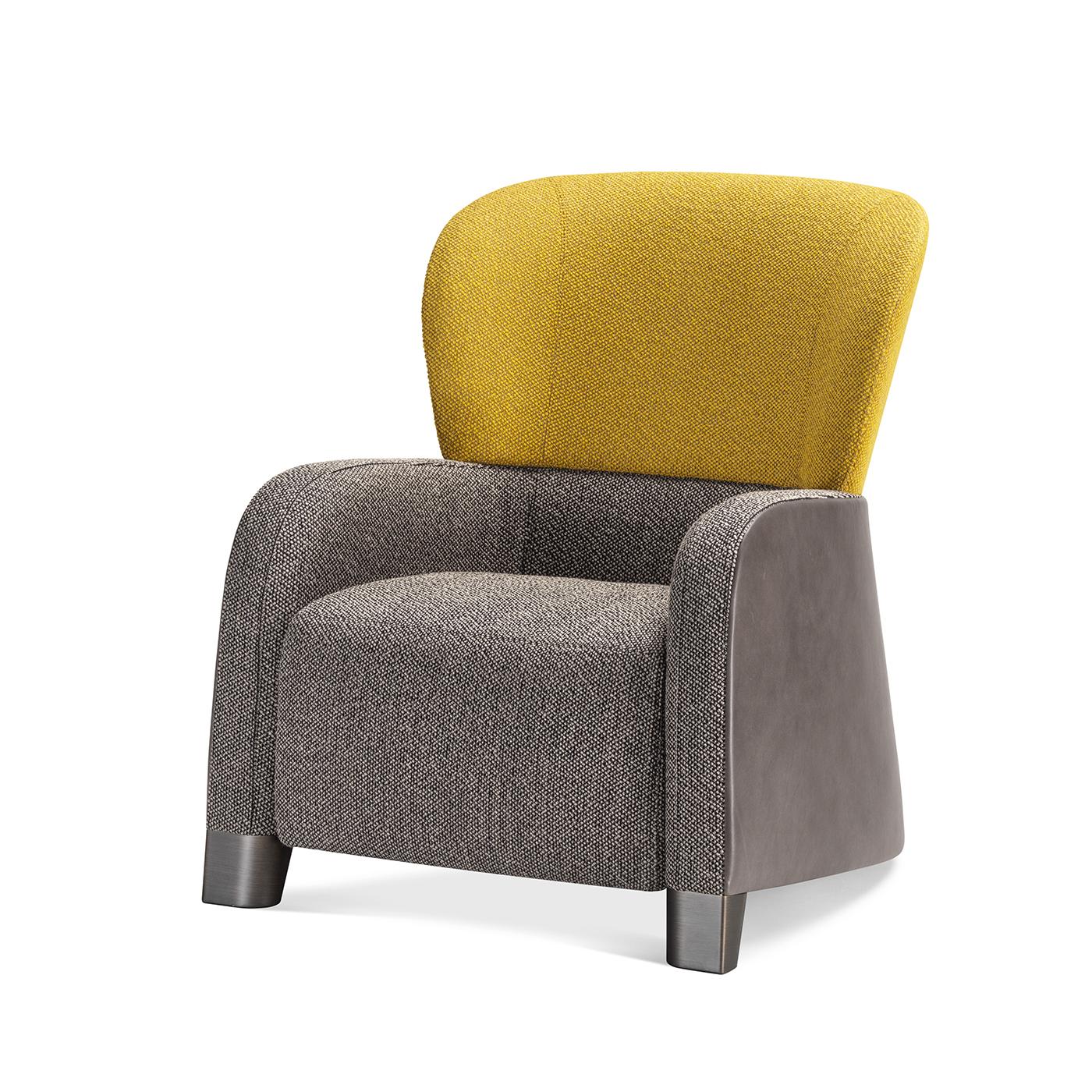 This exclusive armchair boasts a welcoming design resulting equally apt to fit in commercial or residential settings. Raised on bold feet, the silhouette is cleverly sculpted and stuffed to provide the necessary amount of comfort even in case of