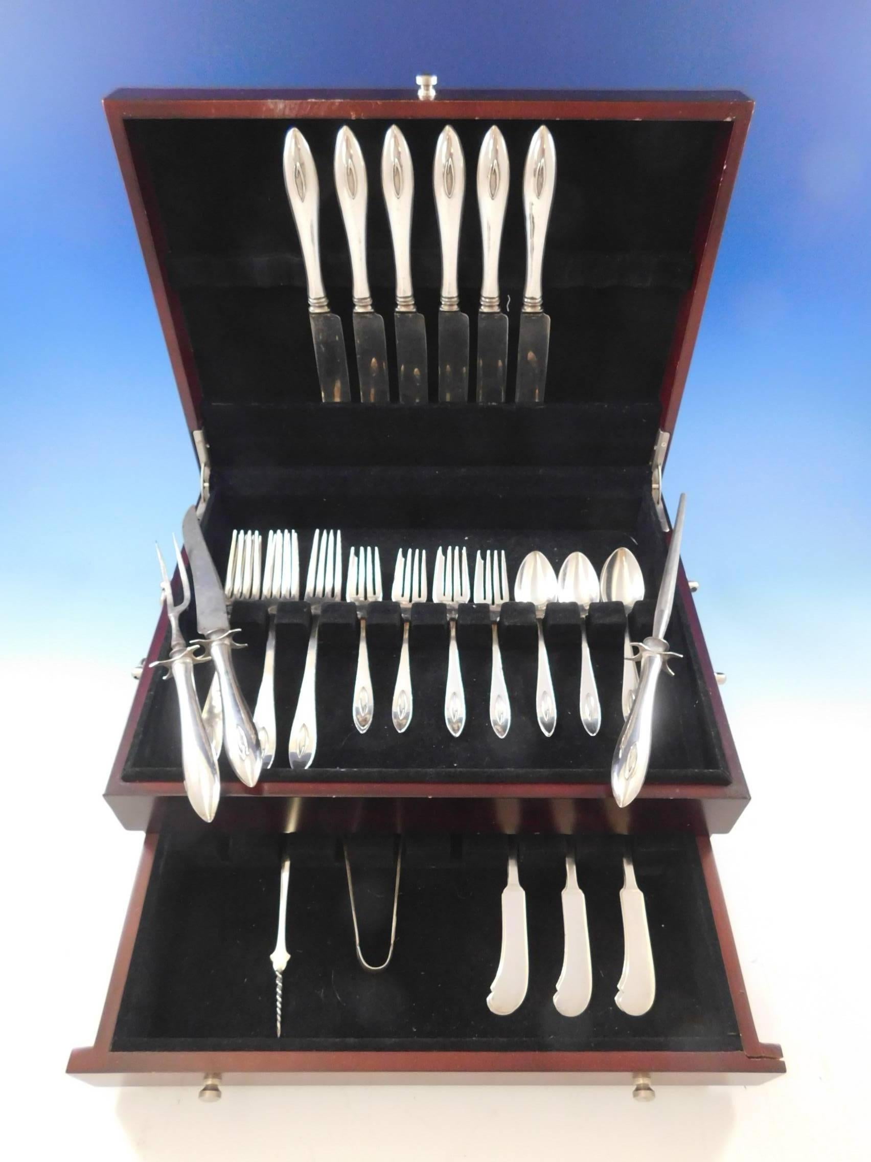 Arts & Crafts Buckingham Narrow, sterling silver dinner size flatware set, 35 pieces. This pattern is by Shreve & Co. of San Francisco, circa 1915. This set includes: 

Six dinner size knives, 9 3/4