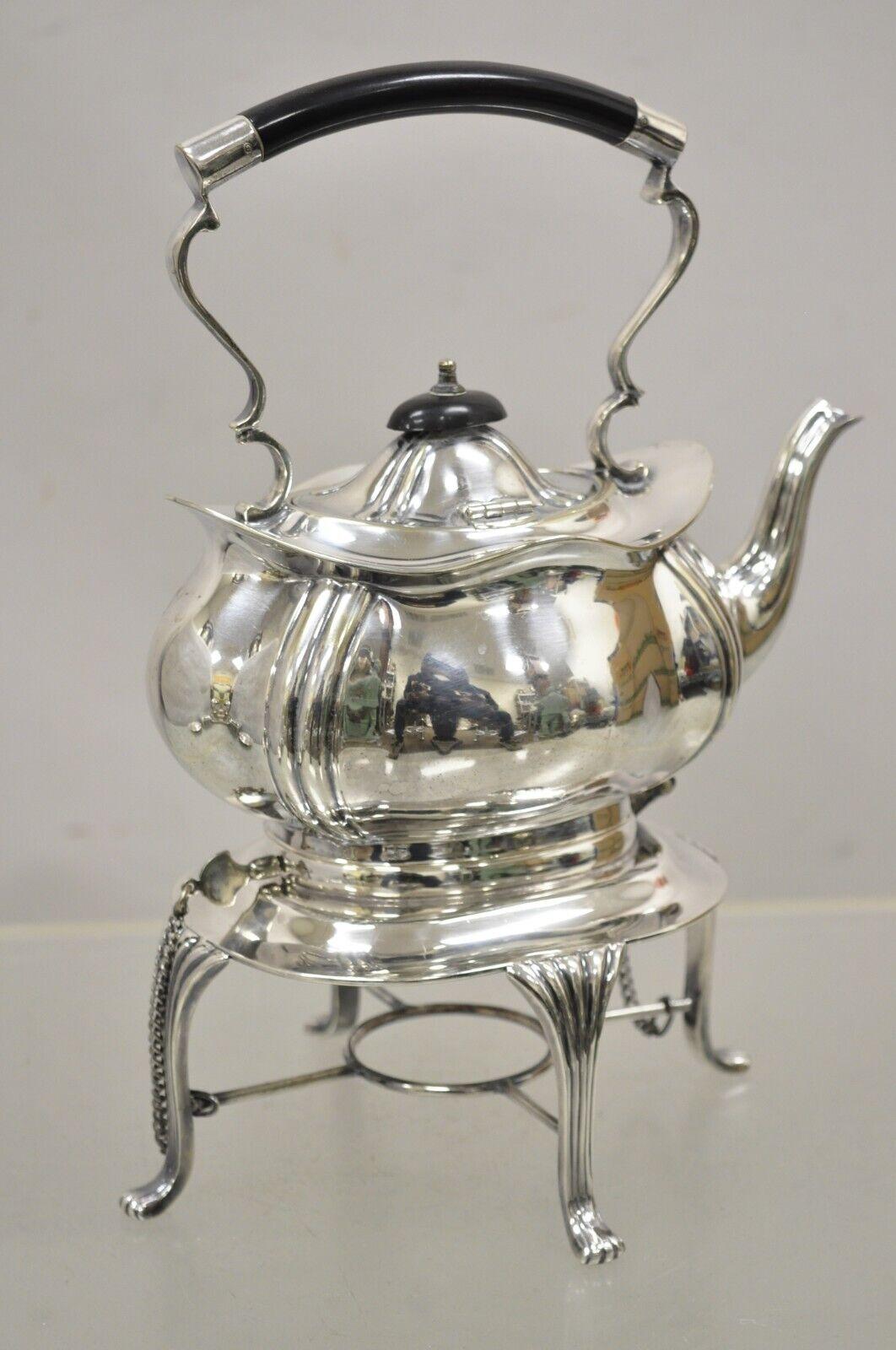 Antique Buckingshire Sheffield England Silver Plated Victorian Tip Kettle and Stand. Item features a unique tipping design with 