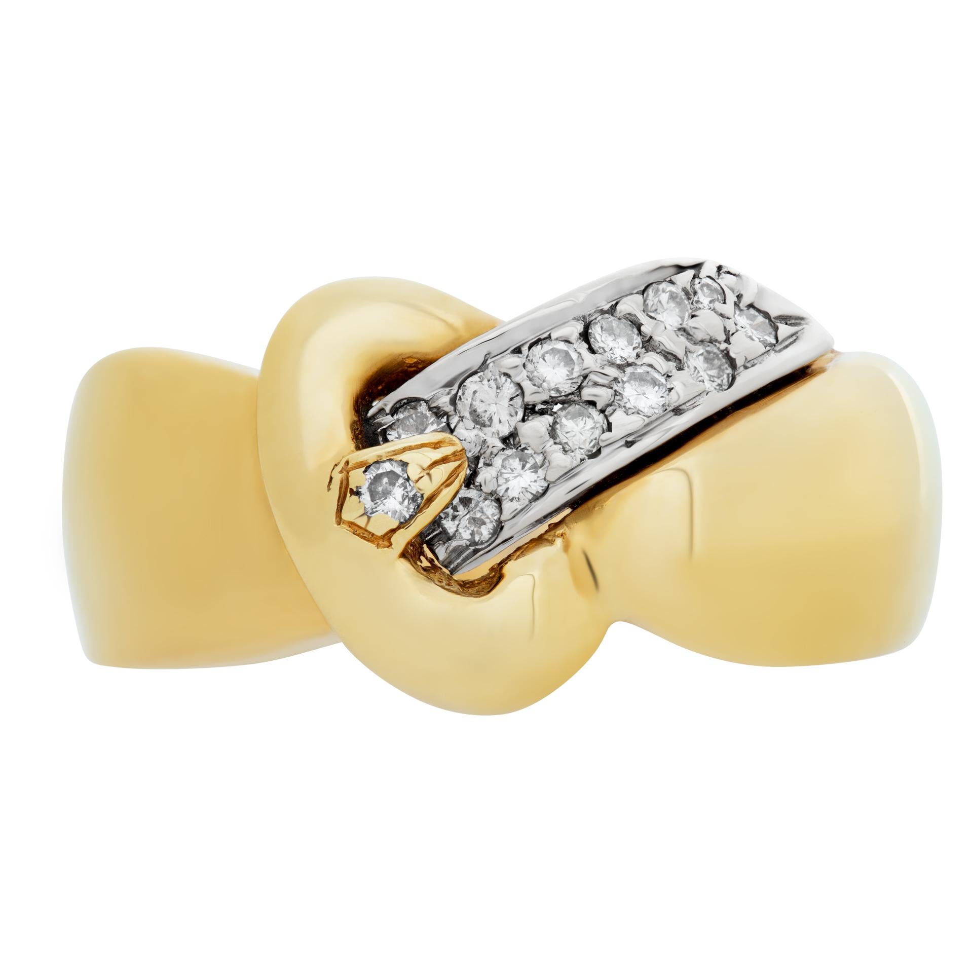 Buckle ring in 18k yellow gold with diamond accents. Size 6, 10.2mm width.This Diamond ring is currently size 6 and some items can be sized up or down, please ask! It weighs 4 pennyweights and is 18k.