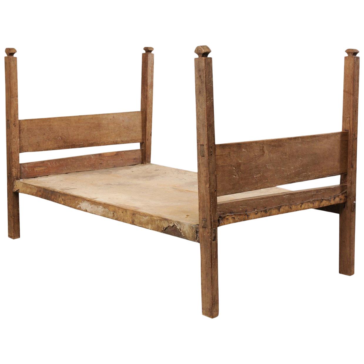 A Charmingly Bucolic Vintage Brazilian Cowhide & Wood Frame Single Size Day Bed For Sale