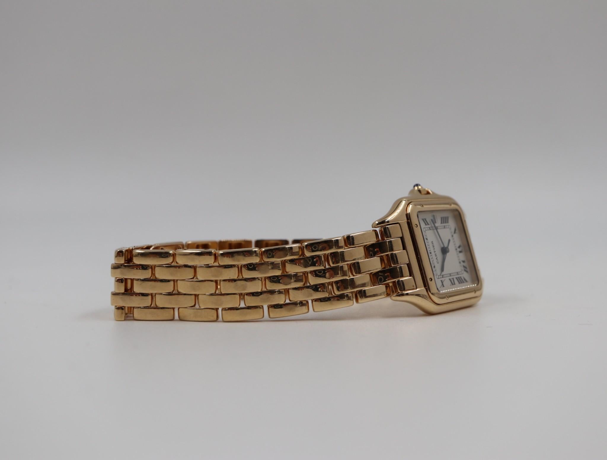 This exact watch is worn by Charlie Sheen in the 1987 movie Wall Street. It is a special coveted watch perfect for any watch collector or anyone who loves Charlie Sheen. Pre-owned Cartier Panthere designed in 18 karat yellow gold. Date window at 3