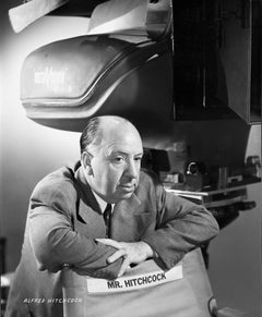 Alfred Hitchcock Leaning on Director's Chair Fine Art Print