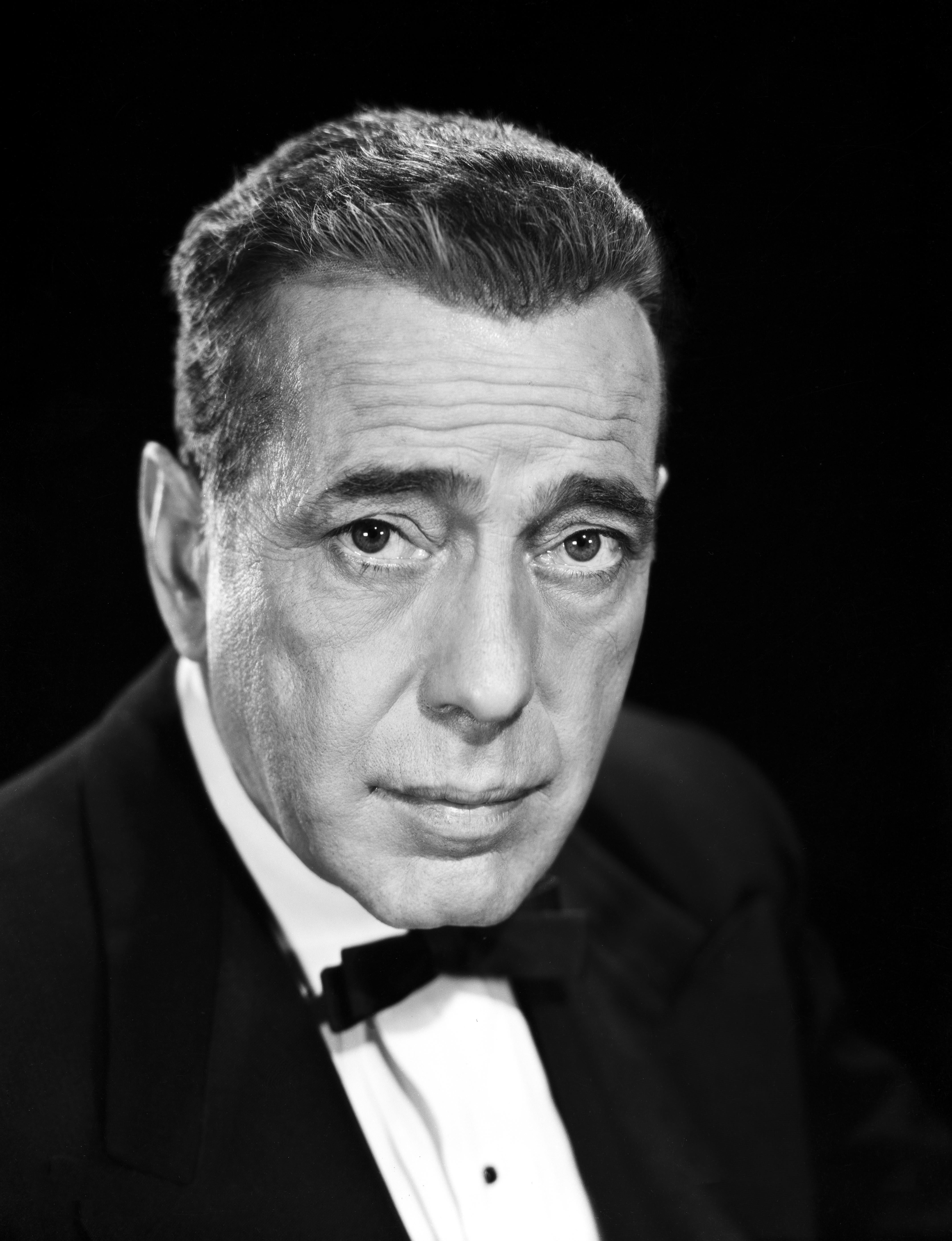 Bud Fraker Black and White Photograph - Humphrey Bogart in Bowtie Movie Star News Fine Art Print