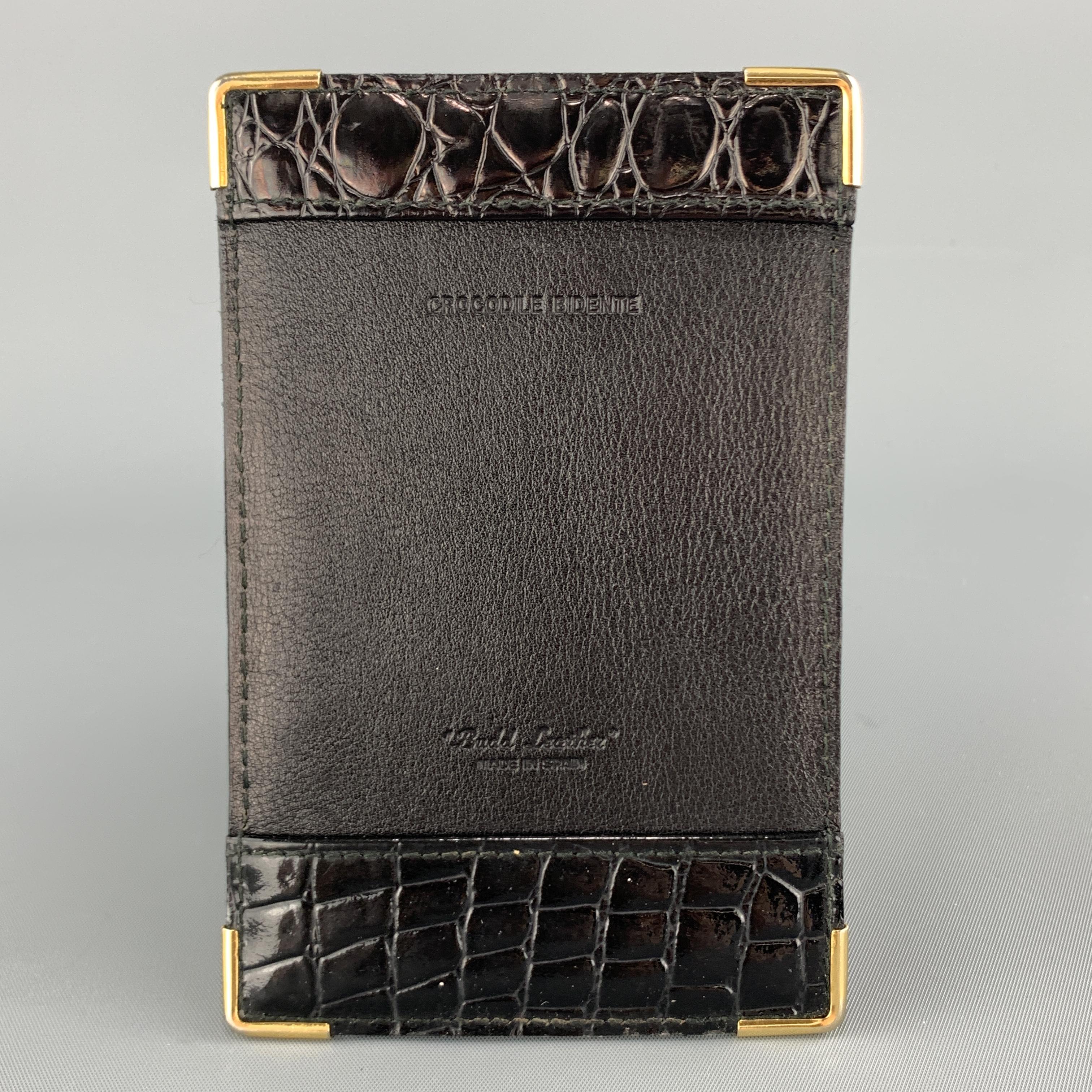 BUDD LEATHER card ticket case wallet comes in black smooth and alligator embossed leather with gold tone metal corners. Made in Spain.

Very Good Pre-Owned Condition.
5.5 x 3.5 in.