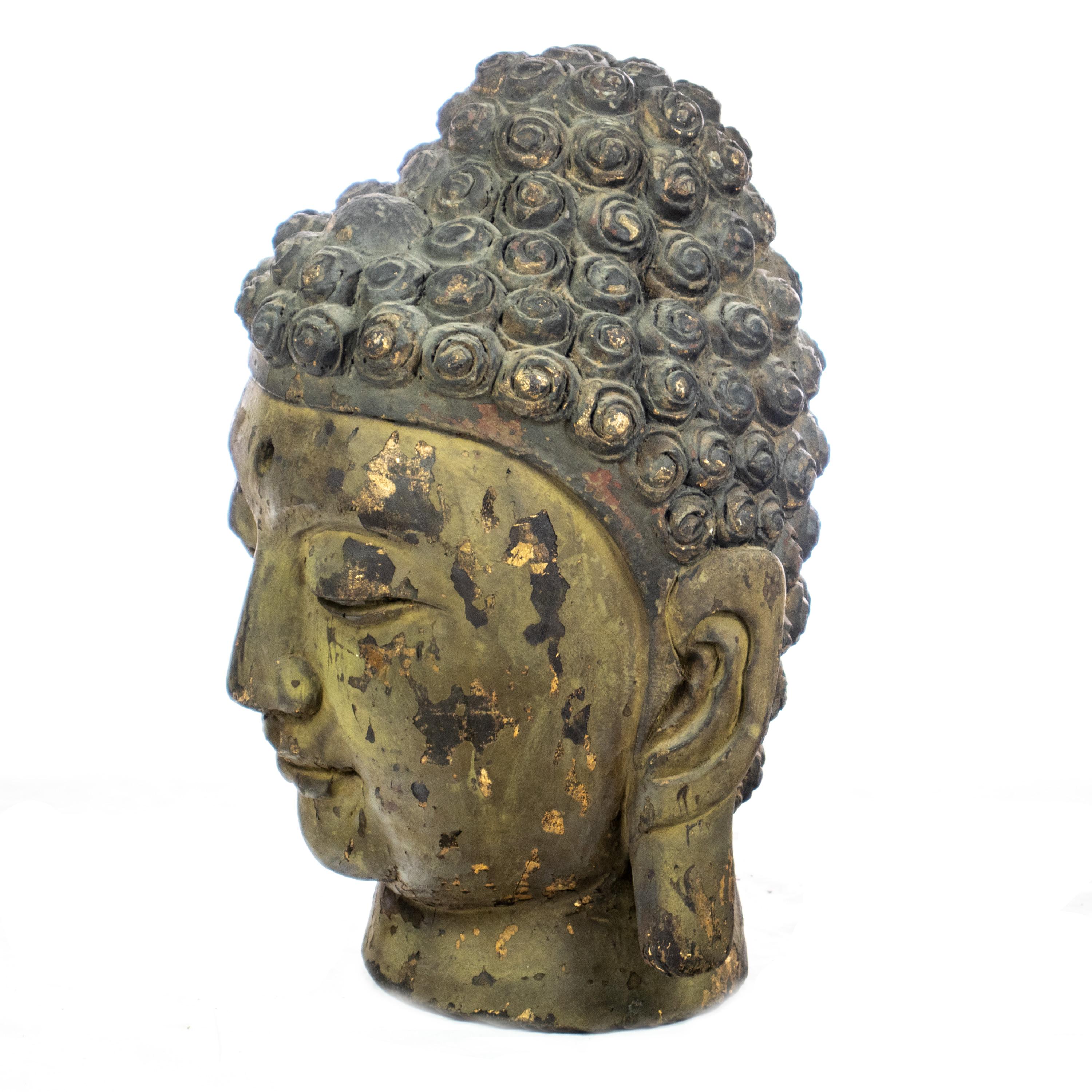 Carved wood Buddha handmade head. Antique Asian sculpture full of tradition and mysticism created with extreme detail evoking ancient times. Made by fantastic local artists which transform natural materials into unique art works. This sculpture is