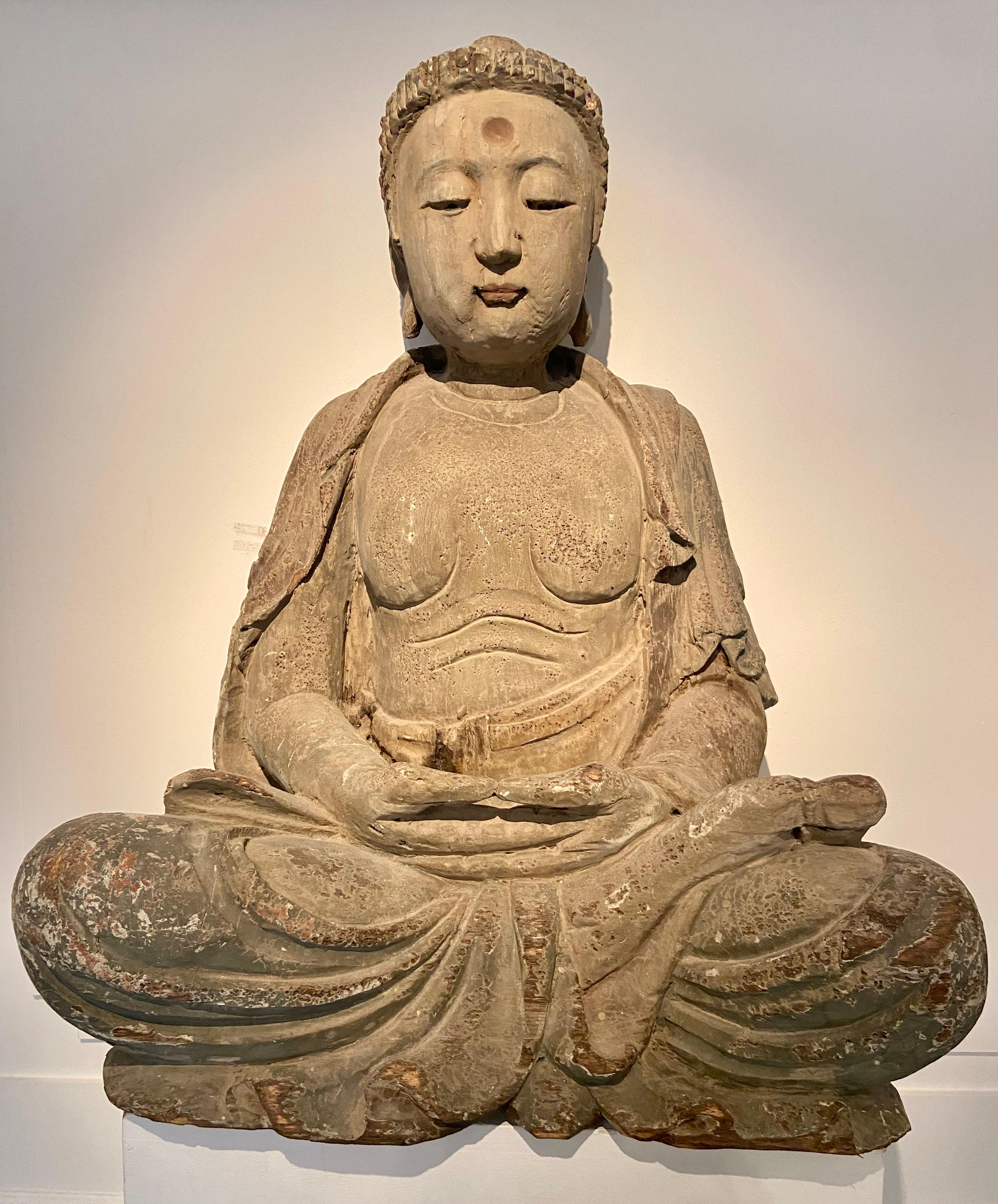 Chinese wooden Buddha, 19th Century.
Impressive sculpture with a good patina.