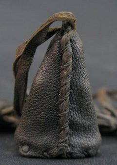 Buddha neckless with bronze hanger in leather bag