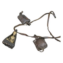 Buddha neckless with bronze hanger in leather bag