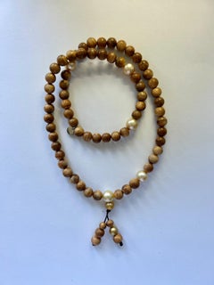 Buddhische Halskette/Armband, leuchtende Holzperlen, goldene Südseeperlen