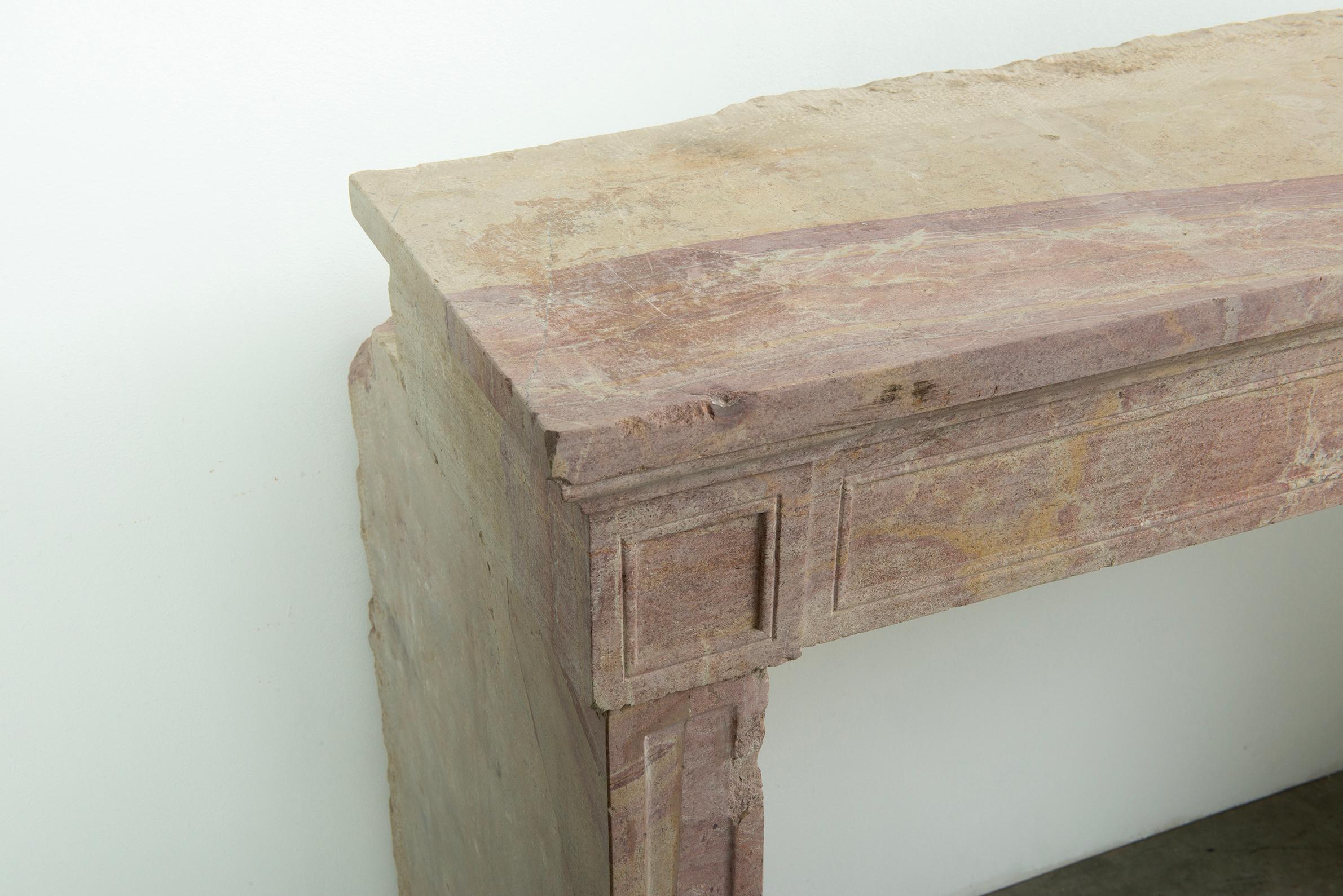 Limestone Budget-Friendly Louis XVI Paneled Fireplace in Rare Multicolored French Limeston For Sale
