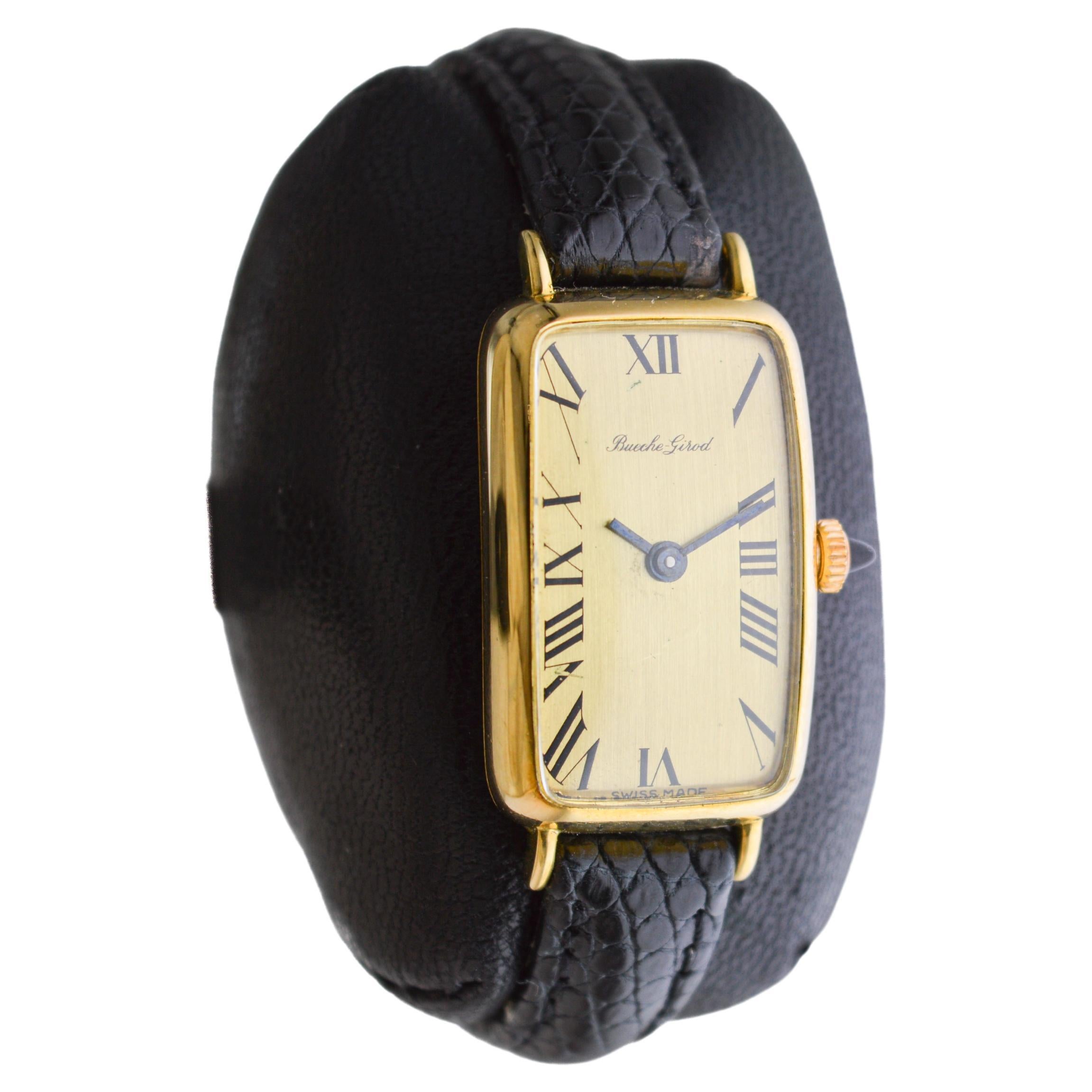 FACTORY / HOUSE: Bueche Girod Watch Company
STYLE / REFERENCE: Art Deco 
METAL / MATERIAL: 18kt Yellow Gold 
CIRCA / YEAR: 1960's 
DIMENSIONS / SIZE: Length 35mm x Width 18mm
MOVEMENT / CALIBER: Manual Winding / 17 Jewels / Caliber 59
DIAL / HANDS: