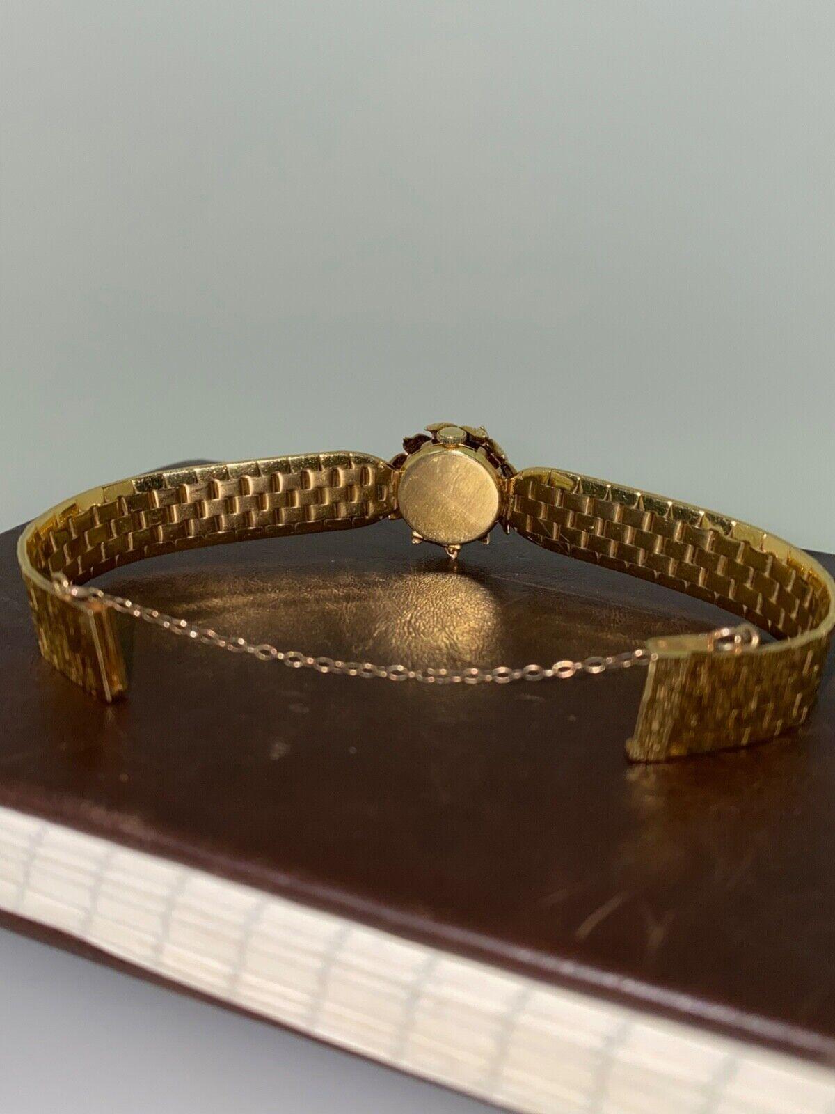 Bueche-Girod Cocktailuhr aus 18 Karat Vollgold mit Rubin und Diamanten, London ca. 1960er Jahre. 4