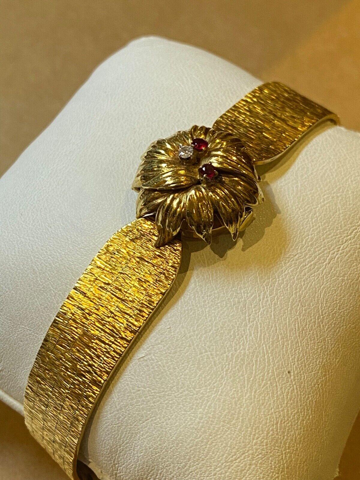 Bueche-Girod Cocktailuhr aus 18 Karat Vollgold mit Rubin und Diamanten, London ca. 1960er Jahre. (Retro)