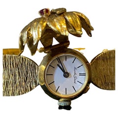 Bueche-Girod Cocktailuhr aus 18 Karat Vollgold mit Rubin und Diamanten, London ca. 1960er Jahre.