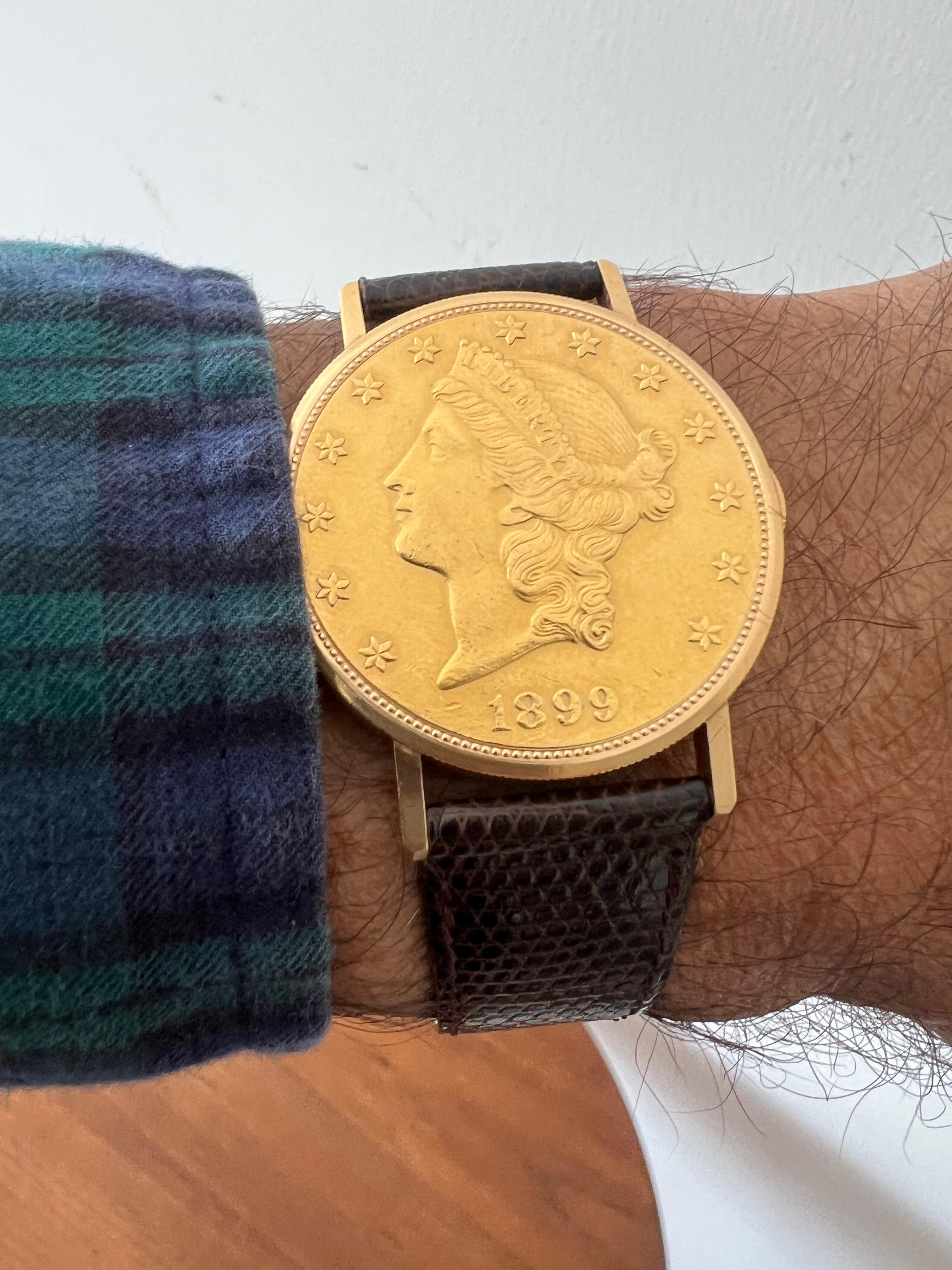 Una rara moneda de oro liberty de 18 quilates (1899 $20) convertida en reloj por Bueche Girod, hacia 1980.
Reloj de pulsera Bueche Girod de cuerda manual de 17 rubíes referencia CG9960.
Hebilla desplegable de latón fabricada en Italia.

