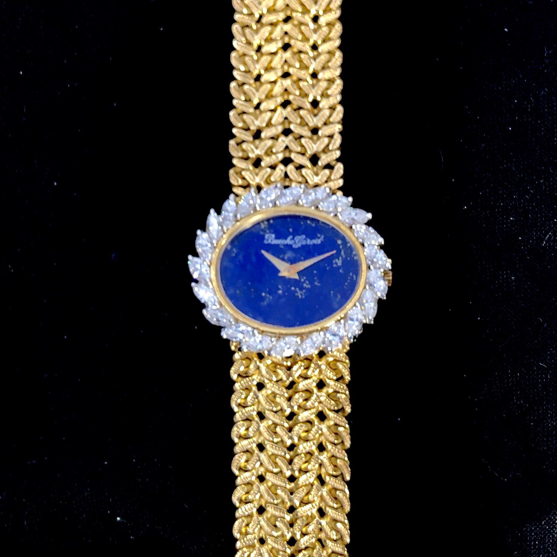 This lovely vintage timepiece was created in Geneva Switzerland. The vivid blue Lapis dial is flecked with Pyrite and Calcite, both of which are signature characteristics for this natural hardstone. The movement is an ultra thin high grade
