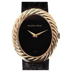 Orologio vintage in oro 18 carati con cinturino in pelle goffrata di coccodrillo di Bueche Girod Orologio vintage in oro 18 carati con cinturino in pelle goffrata di coccodrillo di Bueche Girod