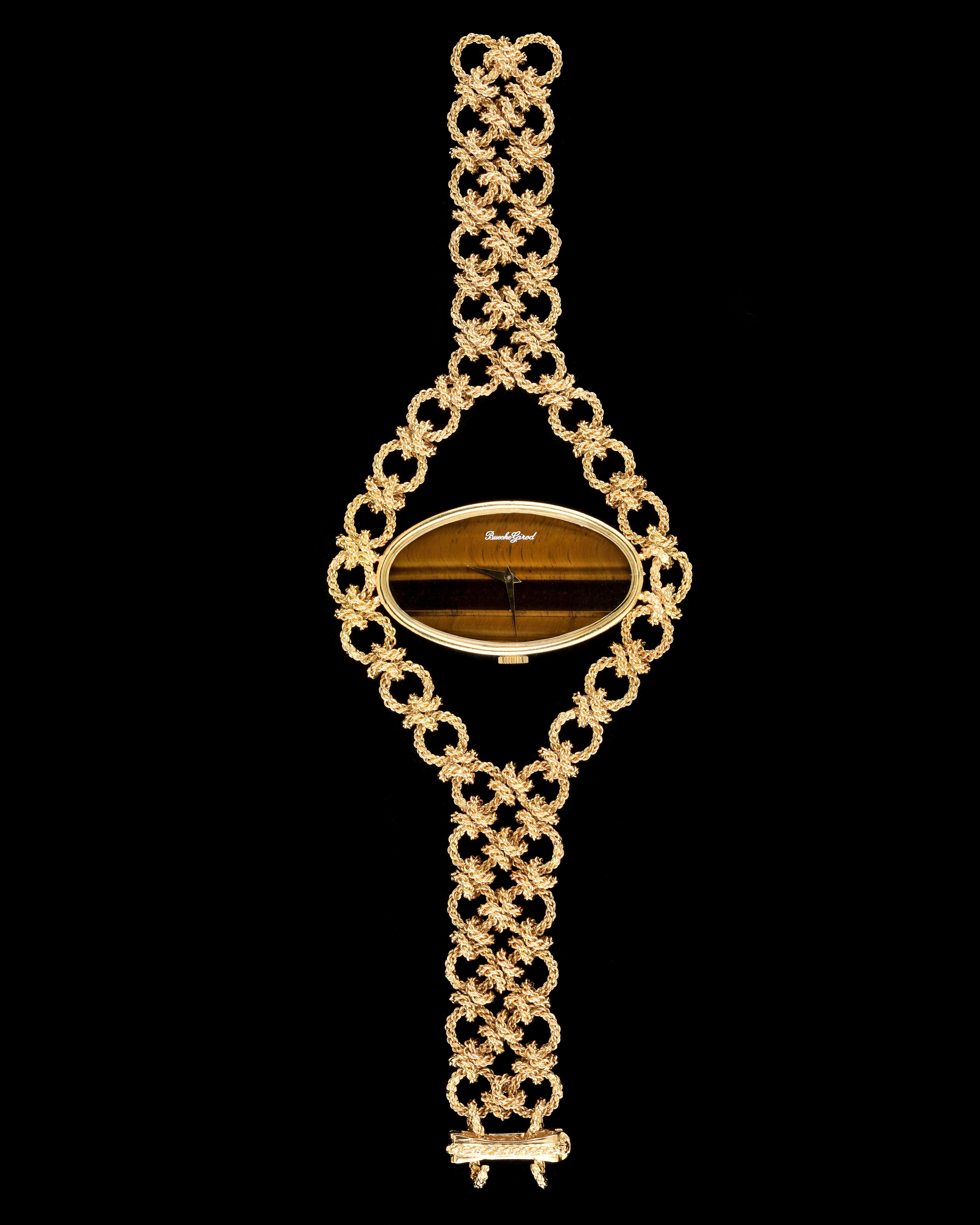 Circa 1970s
Gold and Tiger Eye Gemstone
Length: 18cm
Width: 6.5cm dial, 1.8cm chain
Signed on the dial
Please contact us for a shipping quote
@karryberrebyjewelry