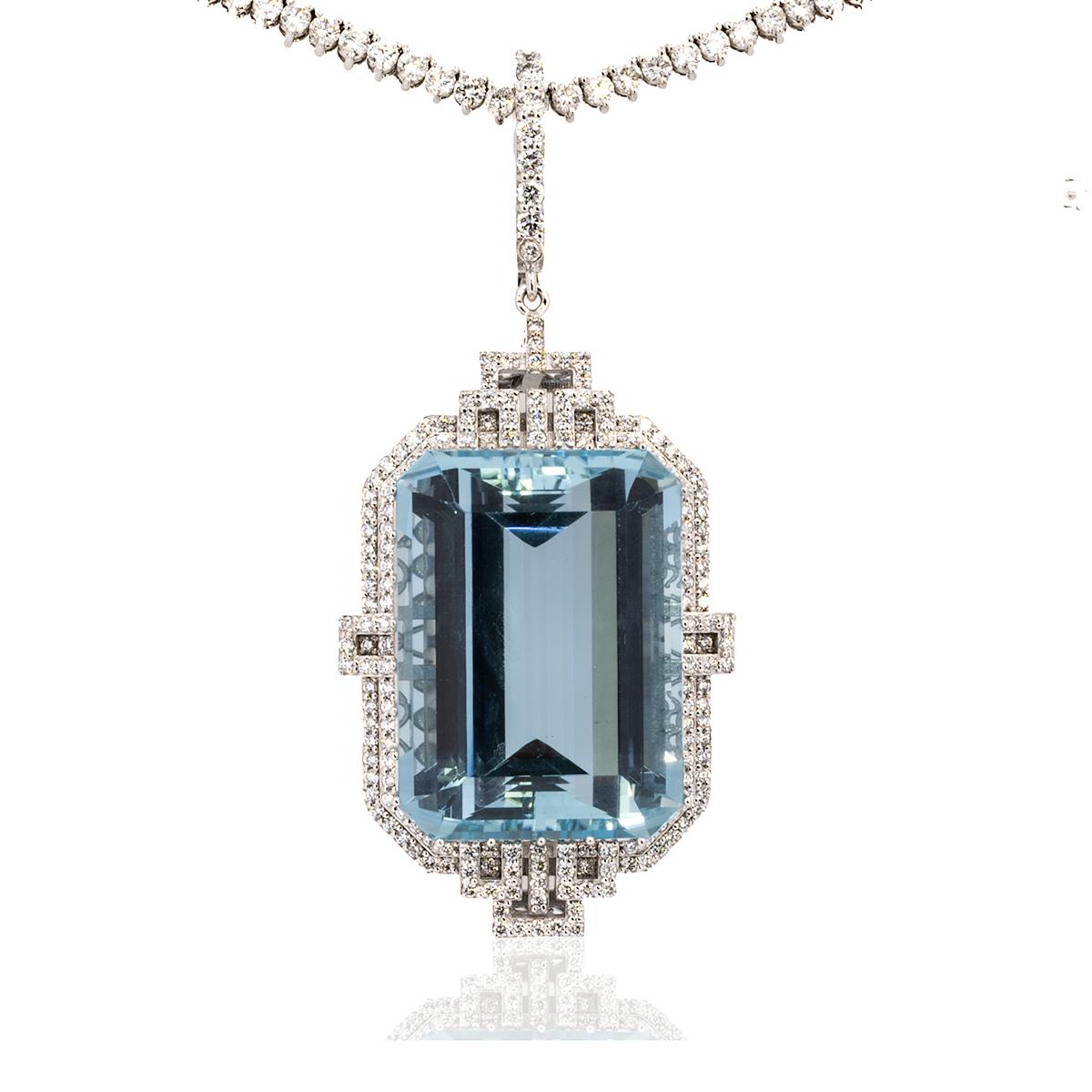 Crafted from 18k white gold and featuring a stunning 76.57 carat Aquamarine from the Buena Vista mine, this pendant is further elevated by 2.45 carats of colorless round brilliant diamonds. Weighing 38.18 grams, this piece is a true testament to