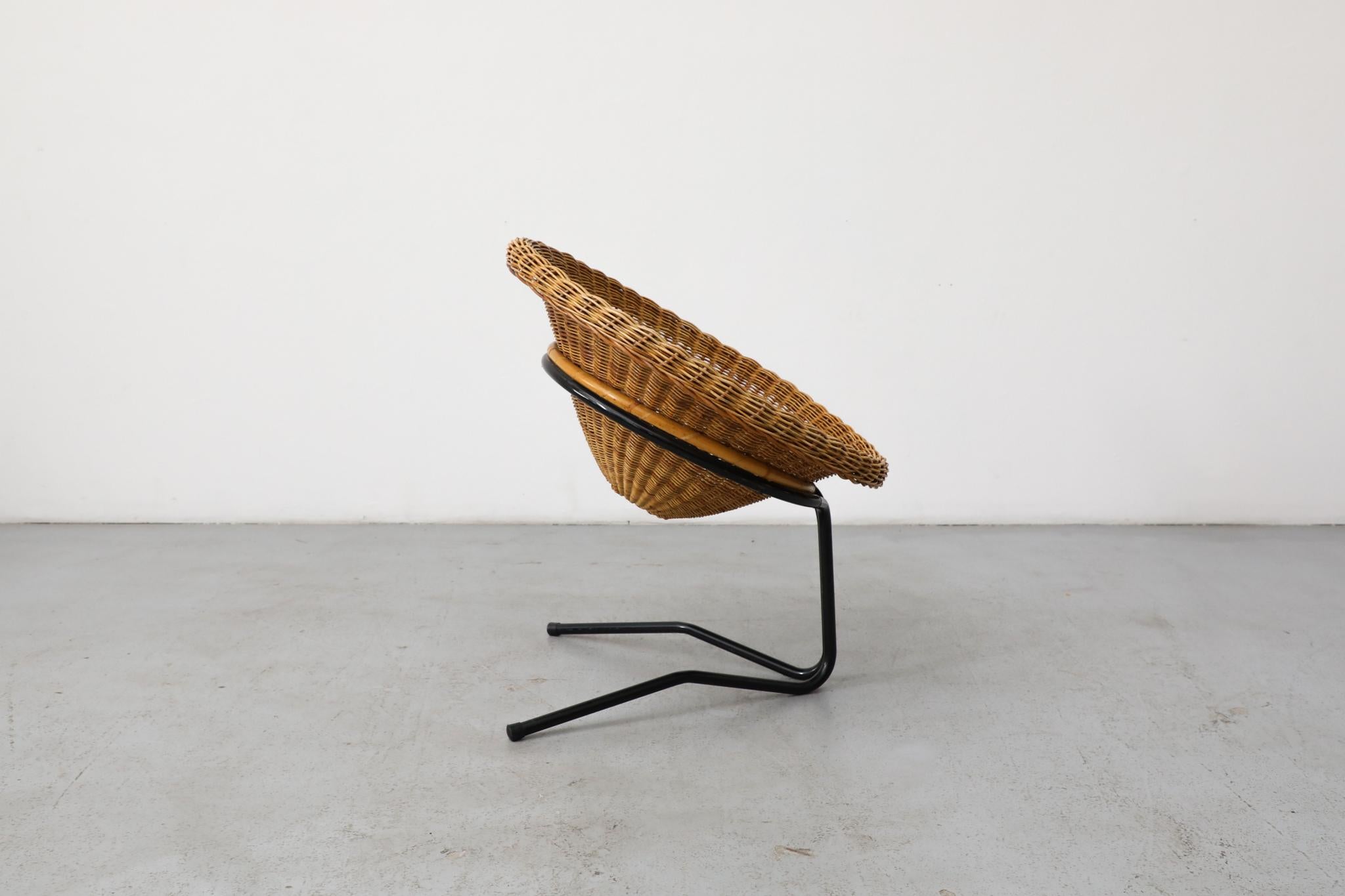 A. Bueno de Mesquita Silla de mimbre flotante de los años 50, Rohe Noordwolde mediados del siglo XX en venta