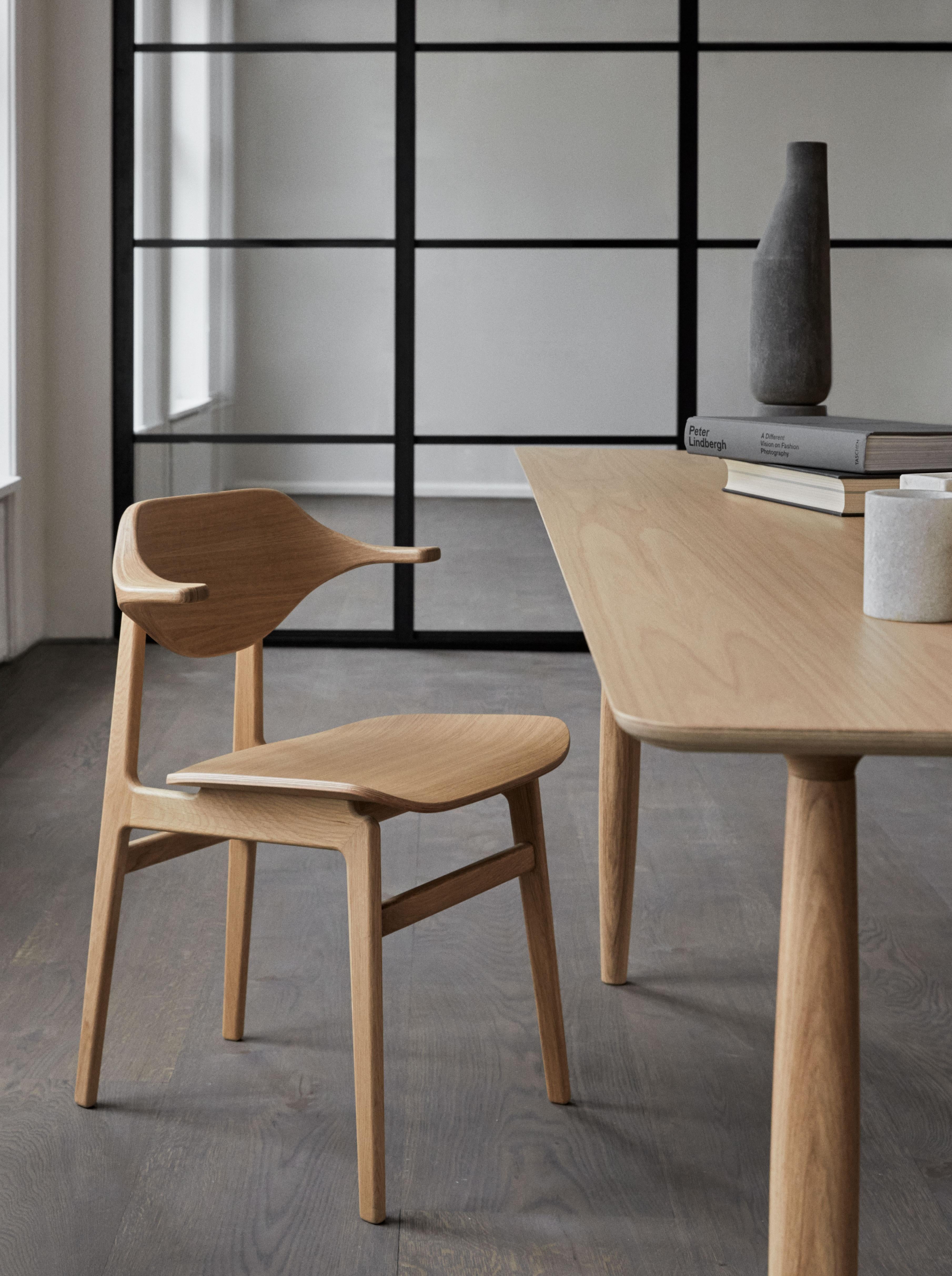 Bufala Chair by NORR11
Dimensions: D 50,5 x W 54,5 x H 75 cm. SH 45,5 cm. Armrest height: 67,5 cm.
Materials: Black oak and upholstery.
Upholstery: Barnum Bouclé Col. 3.

Available in different oak finishes: Natural oak, light smoked oak, dark