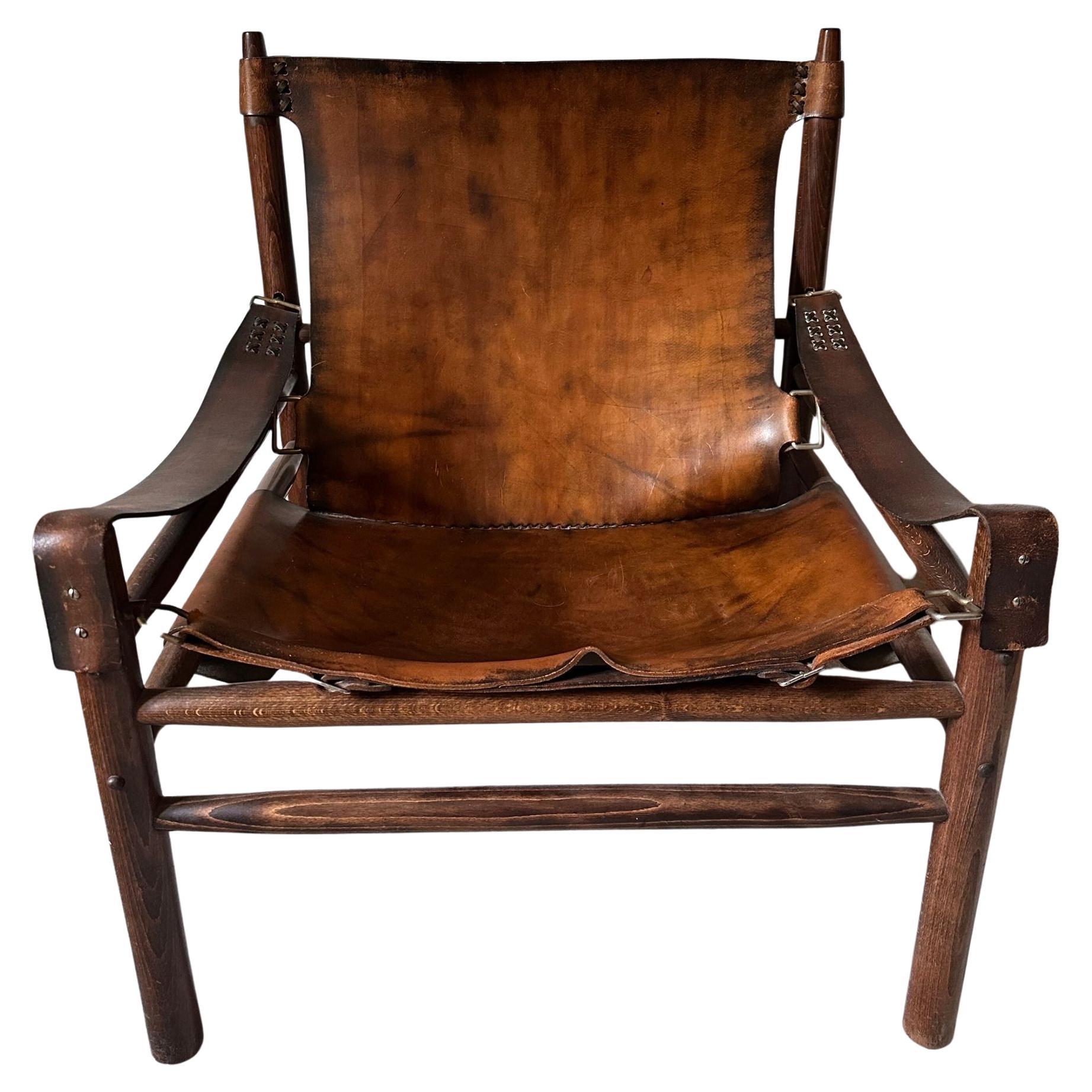 Fauteuil "Safari" en cuir de buffle dans le style d
Arne Norells