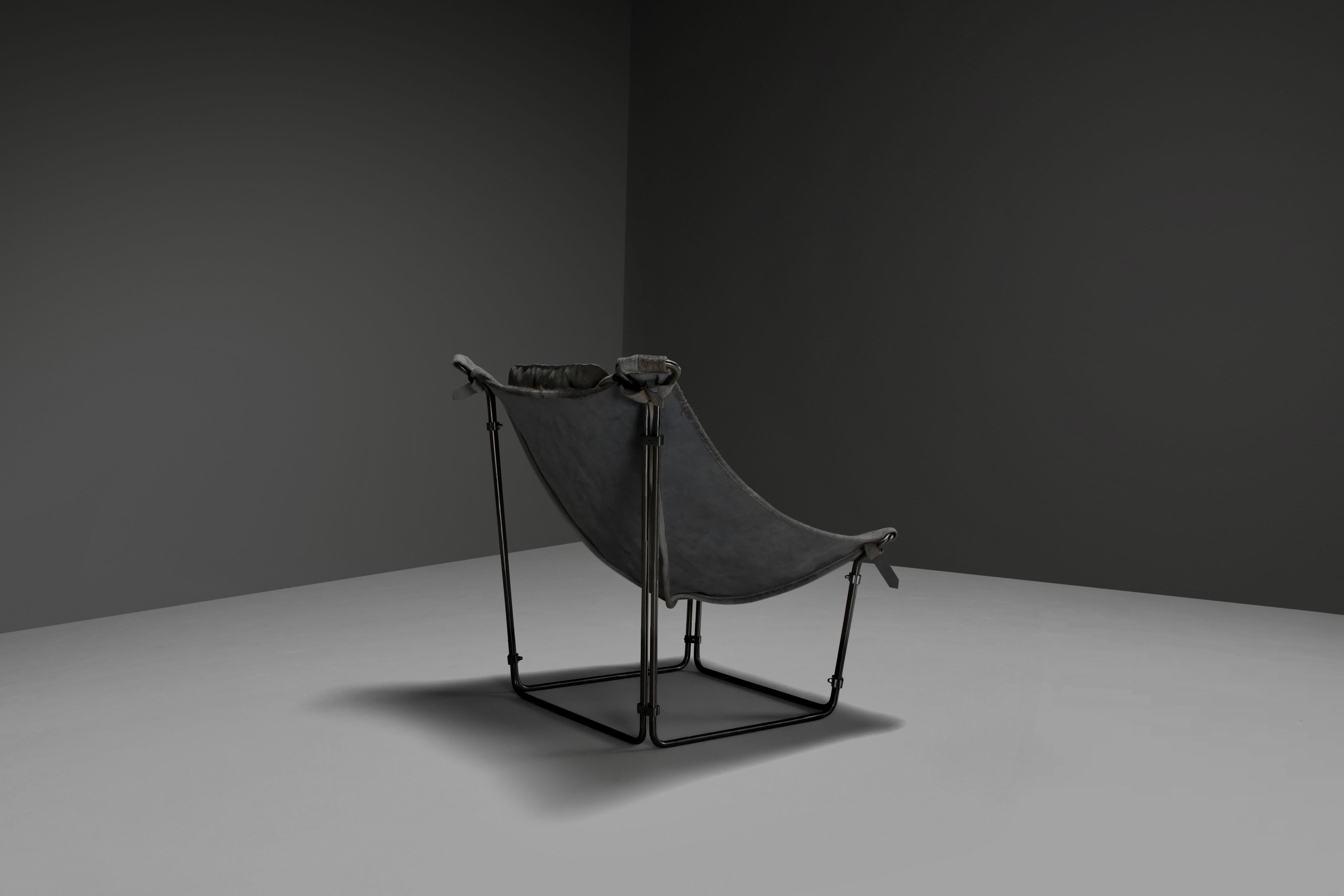 Metal ‘Buffalo’ Lounge Chair in Cow Hide and Steel by Kwok Hoi Chan, France 1969 For Sale