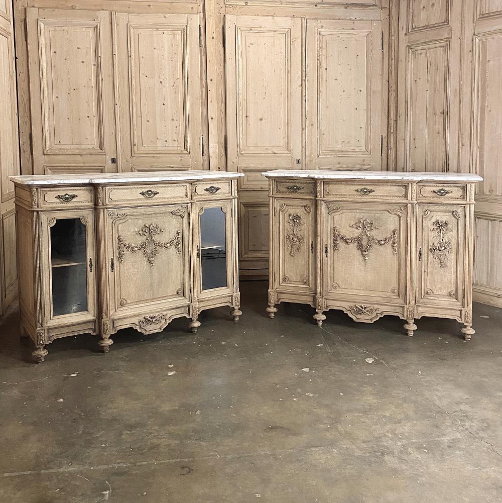 19th century French Louis XVI marble top buffet represents a definitive classical interpretation of ancient Greek and Romanesque architecture, while providing a spacious cabinet below and luxurious marble top serving surface above. Carved foliate