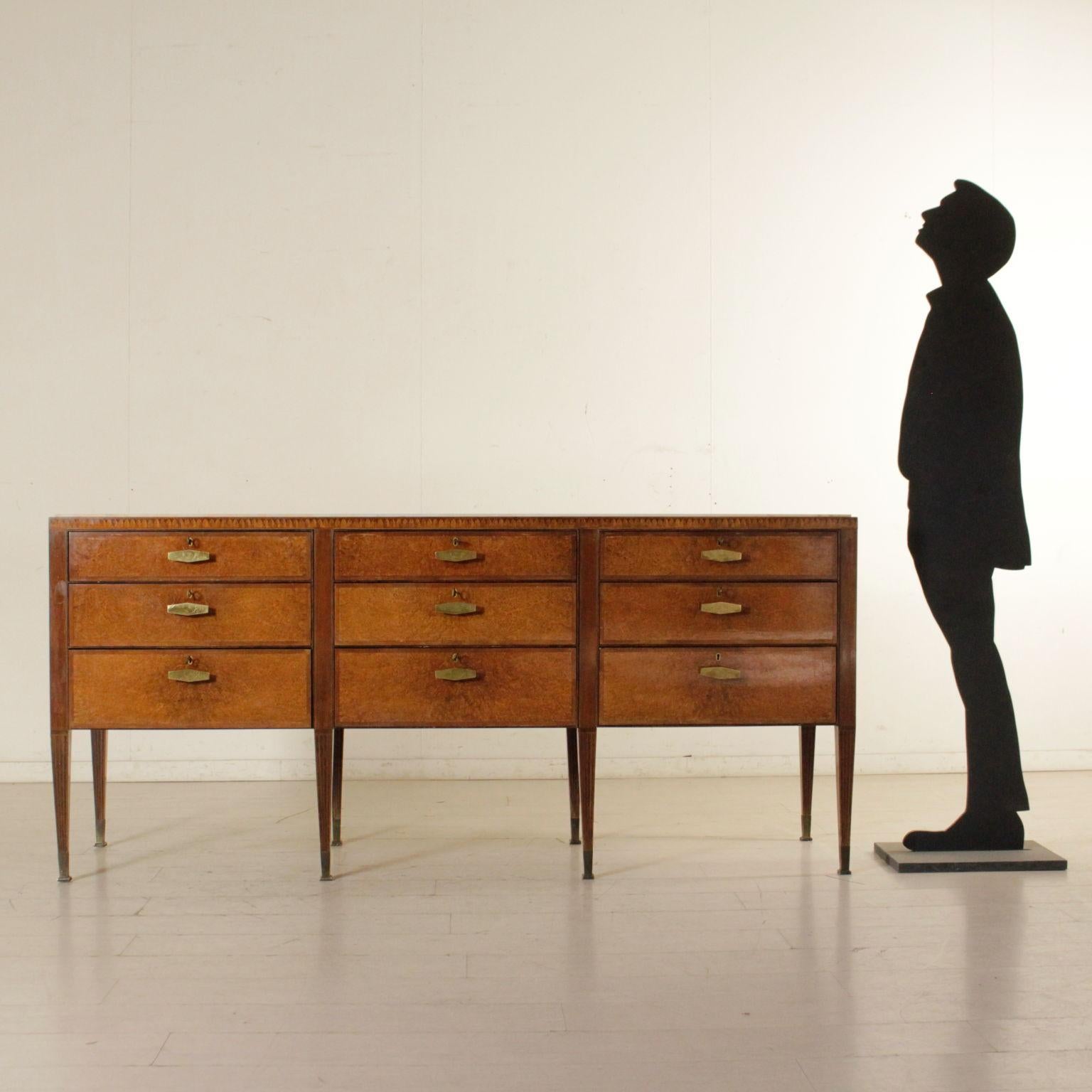 A buffet with drawers attributable to Paolo Buffa (1903-1970), mahogany and brier veneer, inlaid decorations, marble top and brass handles. Manufactured in Italy, 1950s.