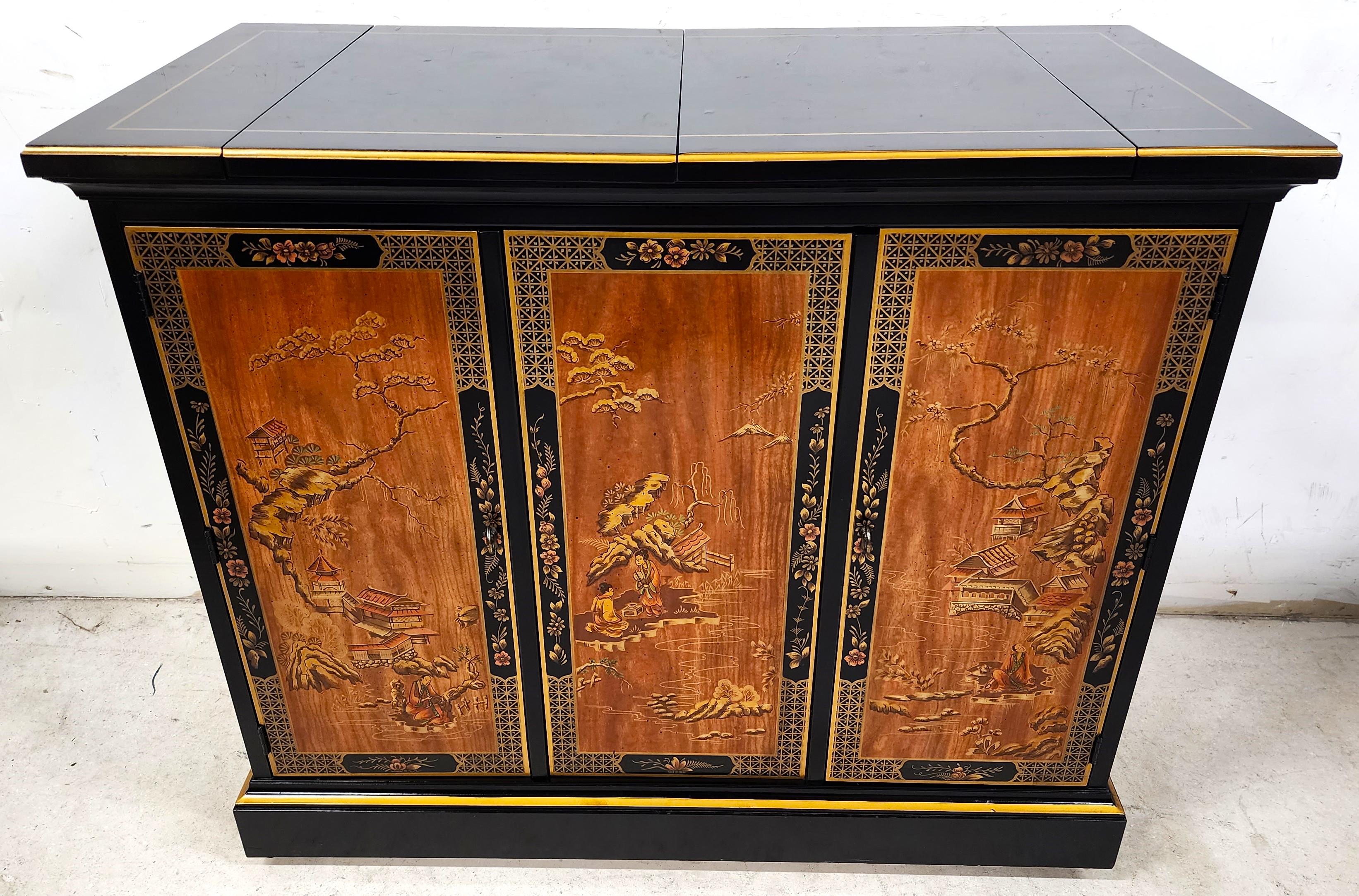 Offering One Of Our Recent Palm Beach Estate Fine Furniture Acquisitions Of A
Rolling Flip Top Drexel Et Cetera Chinoiserie buffet, cabinet, server or dry bar, circa 1978. A rectangular form with black lacquer and natural wood front finished in