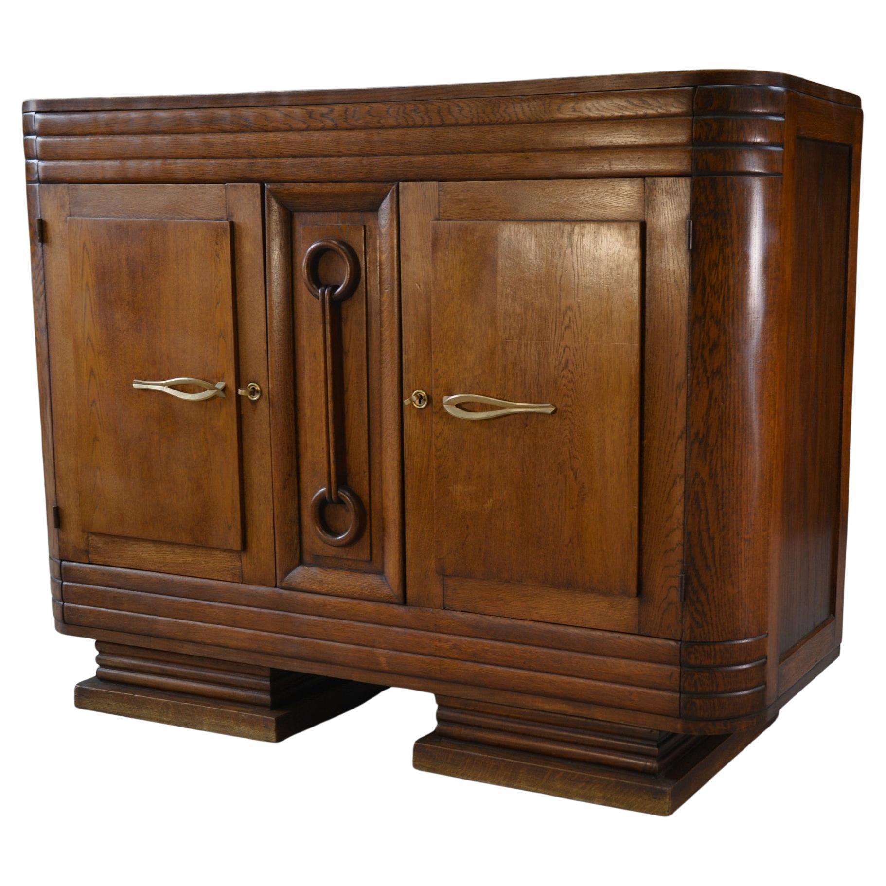 Buffet brutaliste Art déco en chêne massif de Charles Dudouyt 1950's For Sale