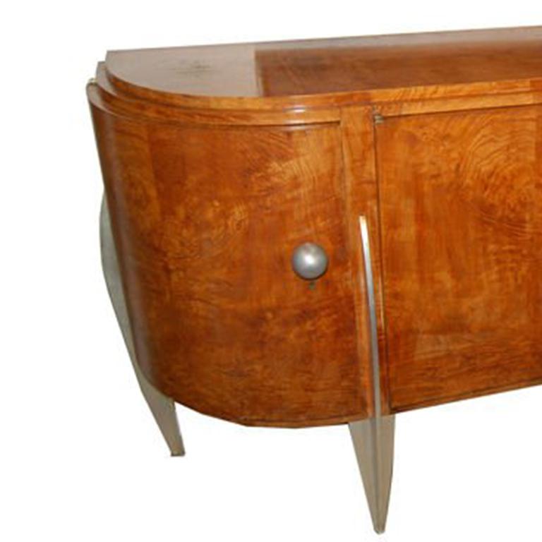 Burr ash and duralumin buffet. Designed by Michel Dufet, 1931. A similar dining suite was exhibited at the Salon D'Automne, Paris 1931. Has a matching dining table with chairs.