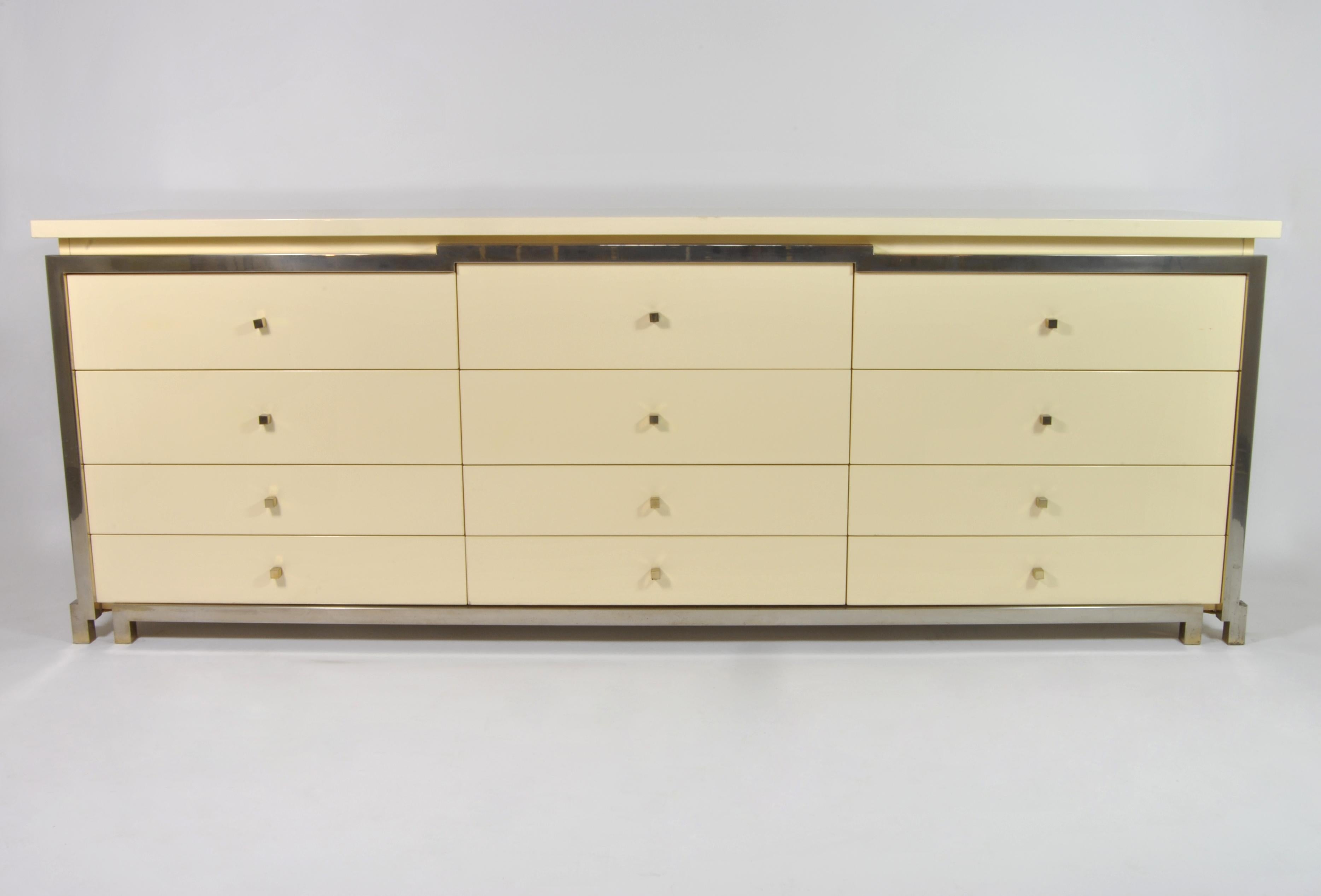 Buffet, design attributed to Romeo Rega, Italy, 1970.
Lacquered wood and brass.