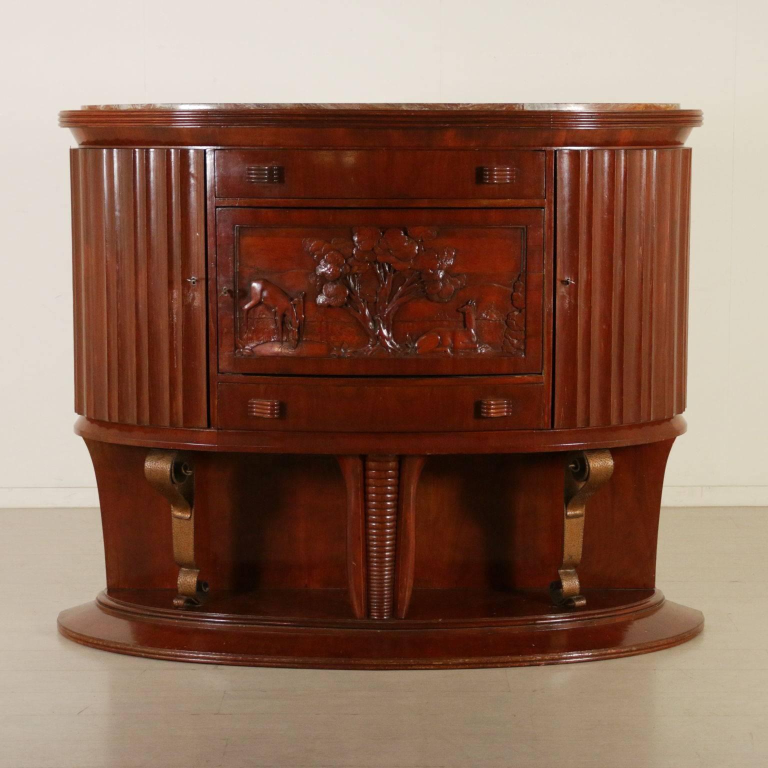 A high buffet, doors with carved drawings and grooves. Marble top, solid wood, semi-lacquered walnut veneer, brier veneered interiors. Manufactured in Italy, 1950s.