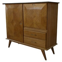 Buffet secrétaire en chêne avec un plateau cuir et pieds compas 1960's