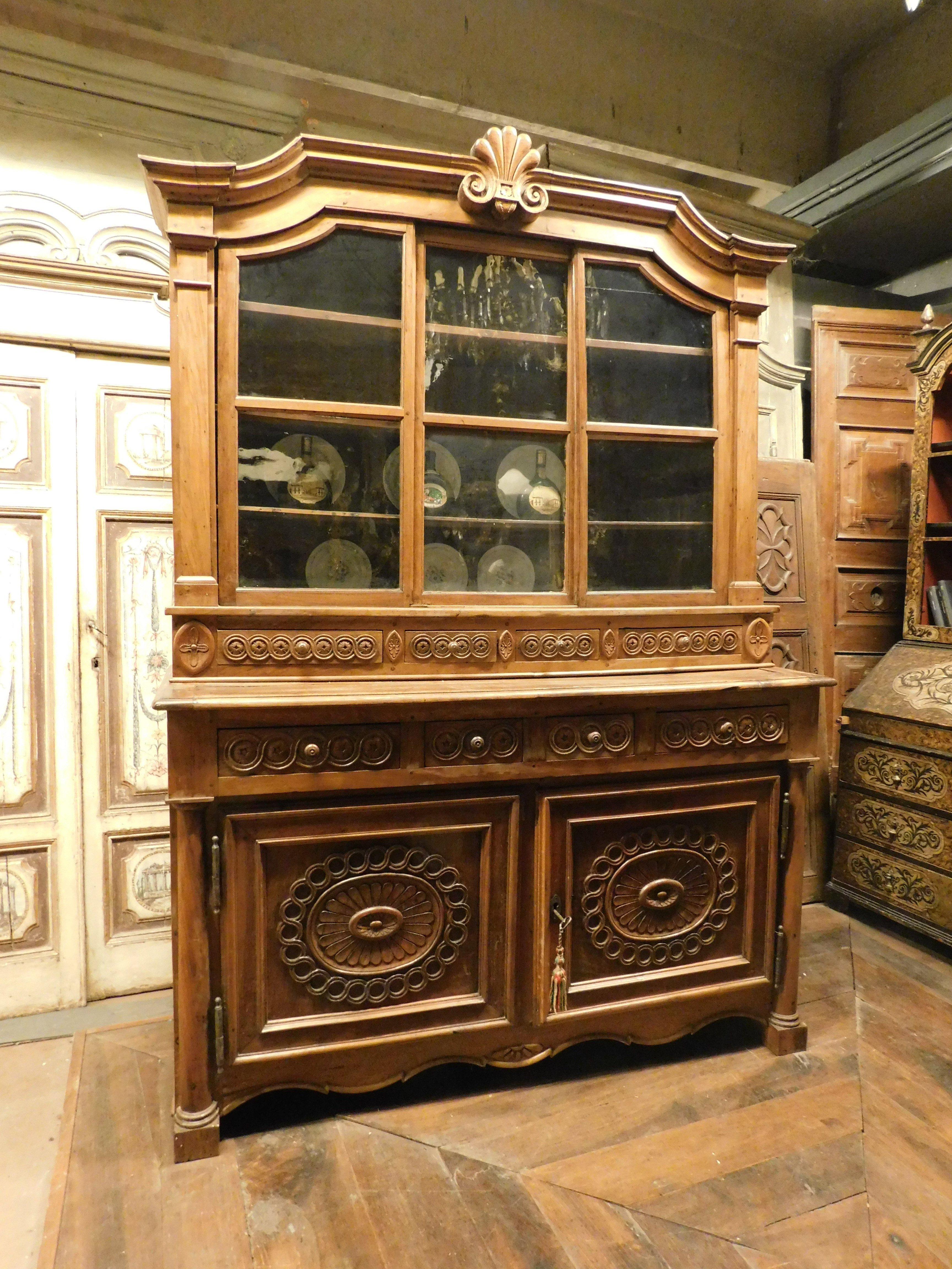 Italian Buffet sideboard, in richly carved walnut with glass doors, Italy For Sale